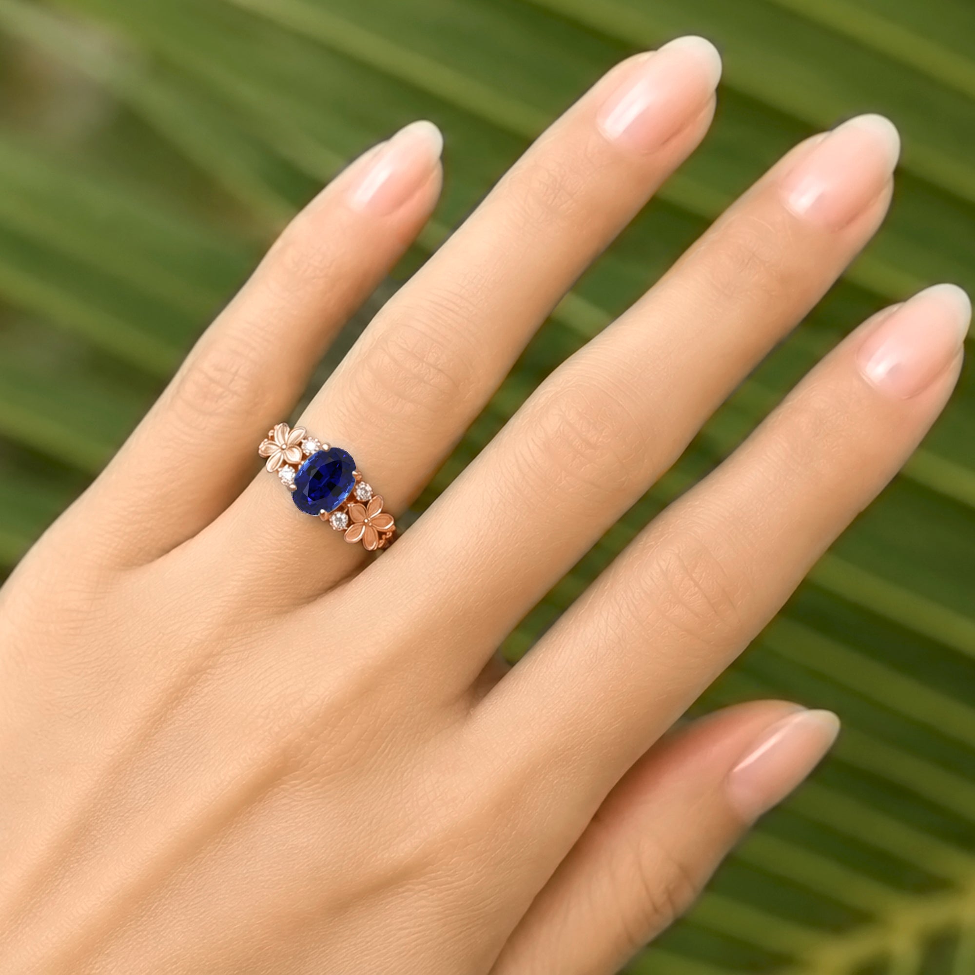 Oval blue sapphire plumeria flower diamond ring in rose gold