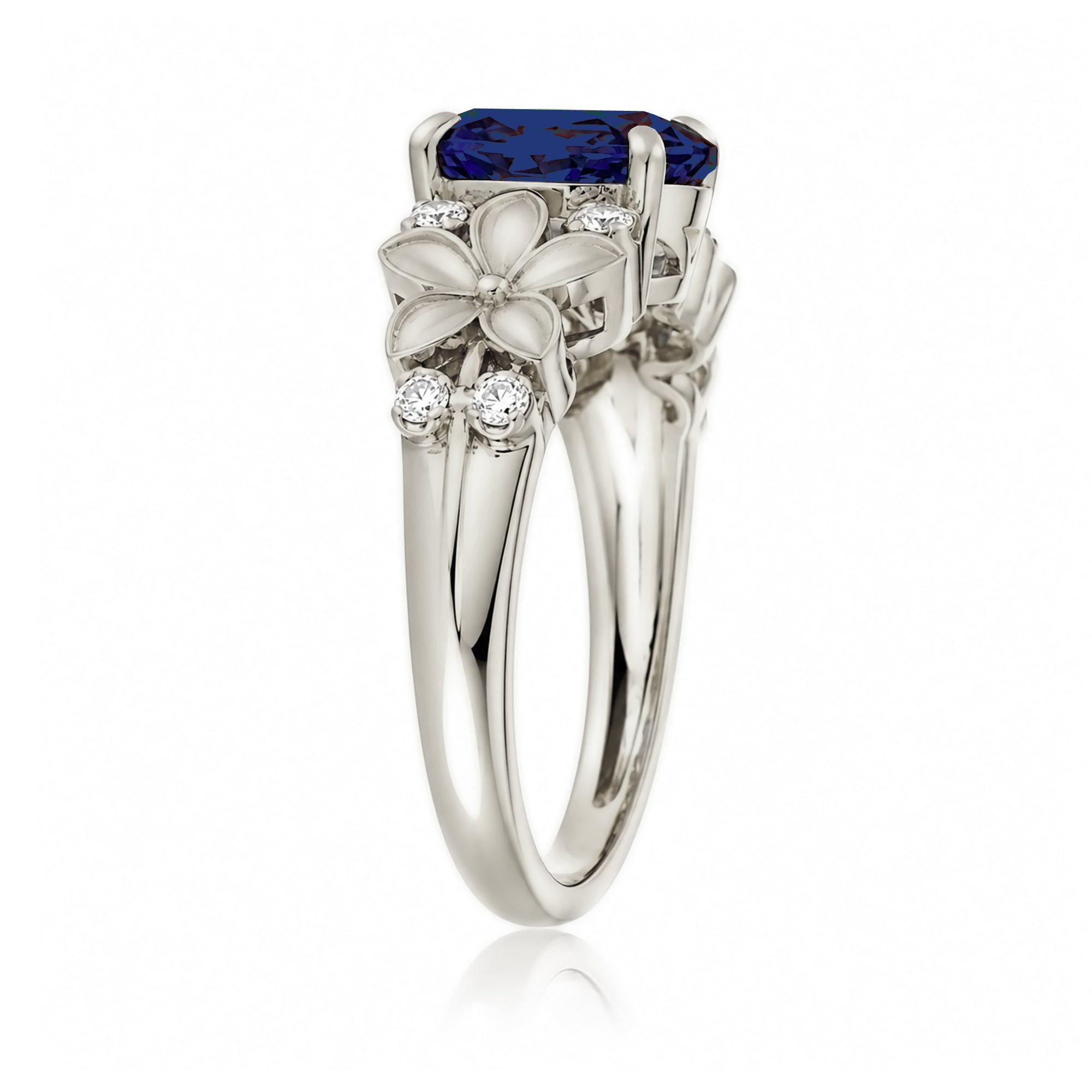 Oval blue sapphire plumeria flower diamond ring in white gold