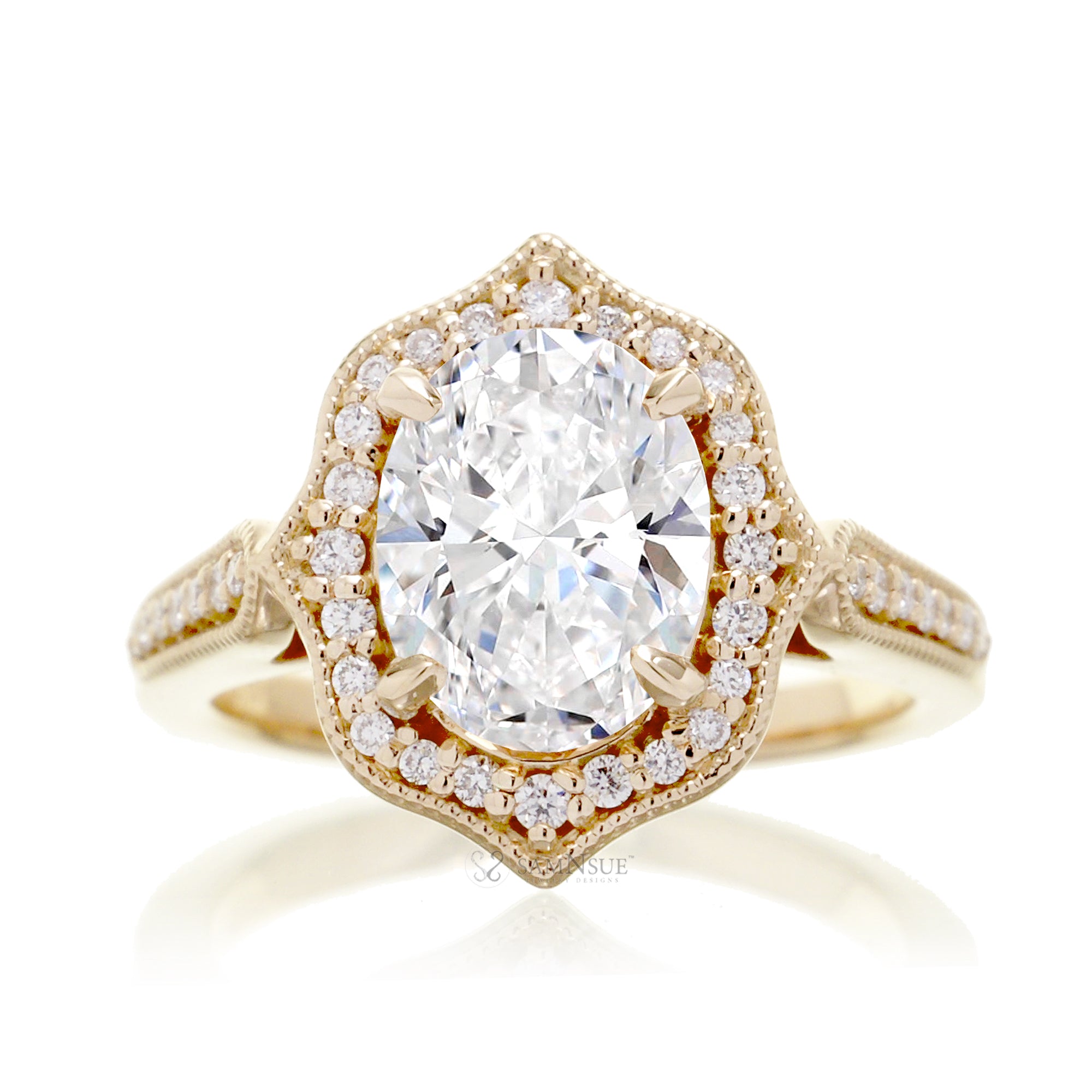 Vintage Oval Diamond and Diamond Halo Ring in Yellow Gold
