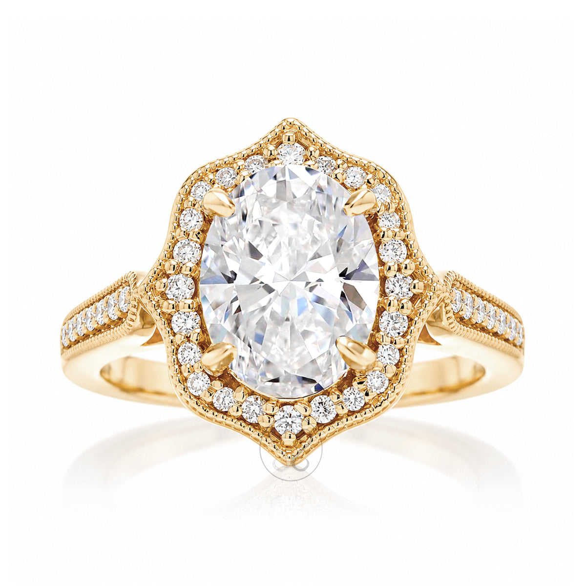 Vintage Oval Diamond and Diamond Halo Ring in Yellow Gold