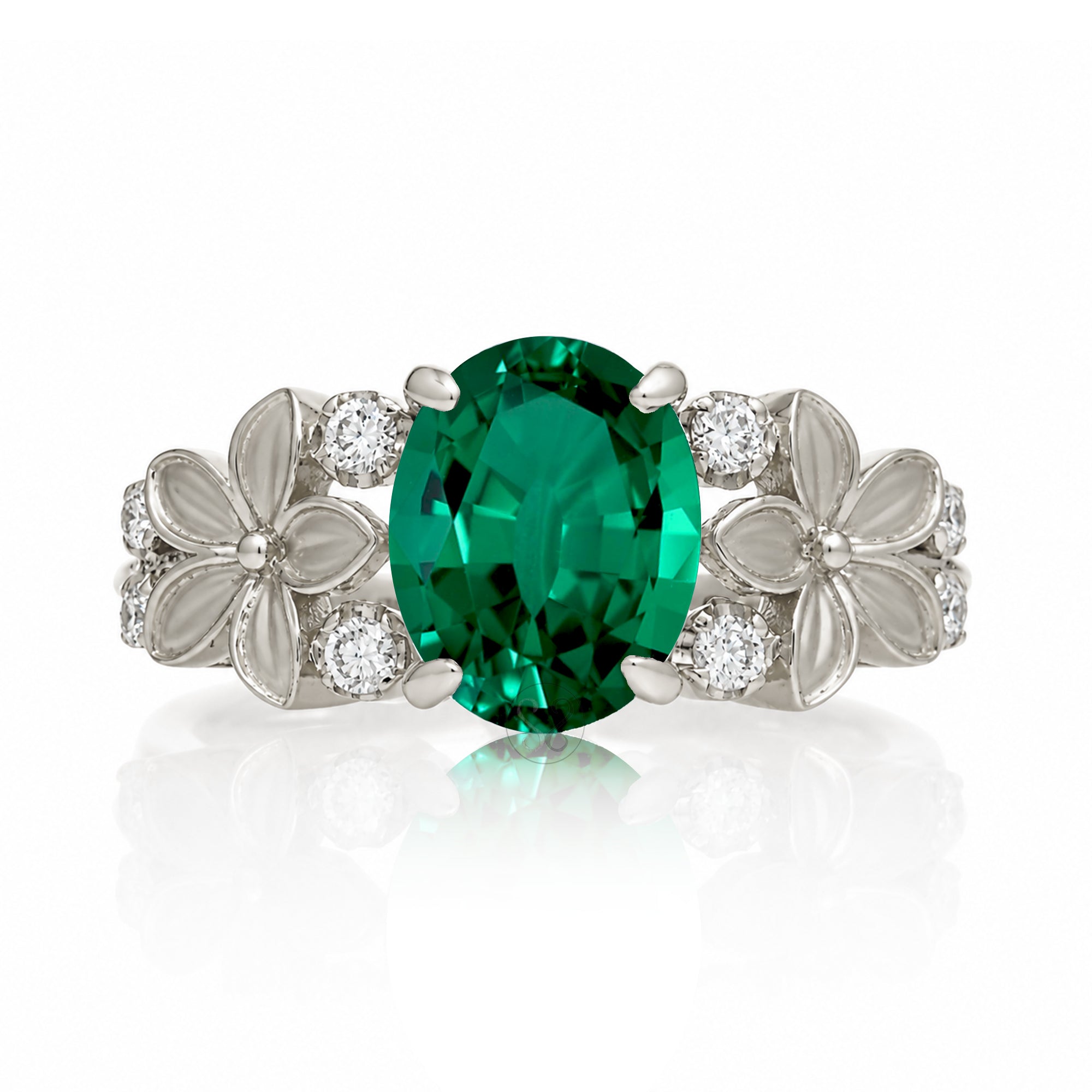 Oval emerald diamond ring with plumeria flower island style white gold