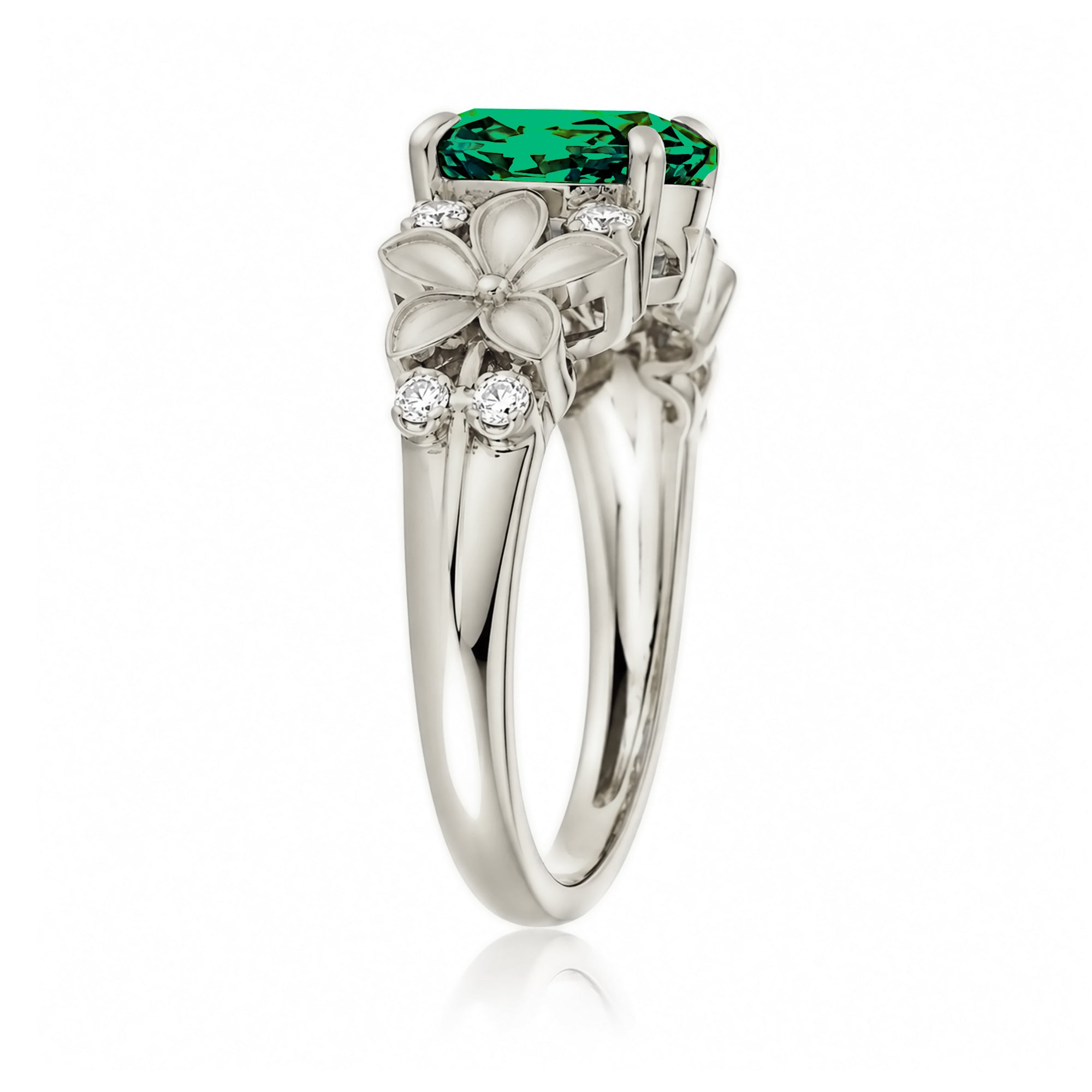 Oval emerald diamond ring with plumeria flower island style white gold