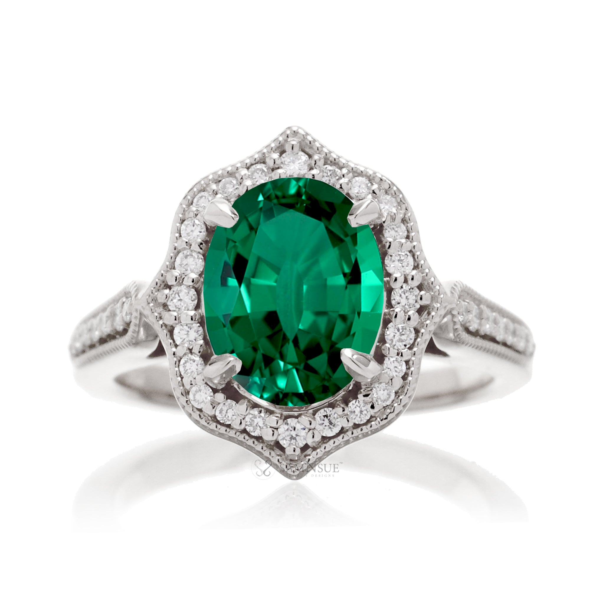 Elegant Oval Emerald and Diamond Ring in White Gold Platinum
