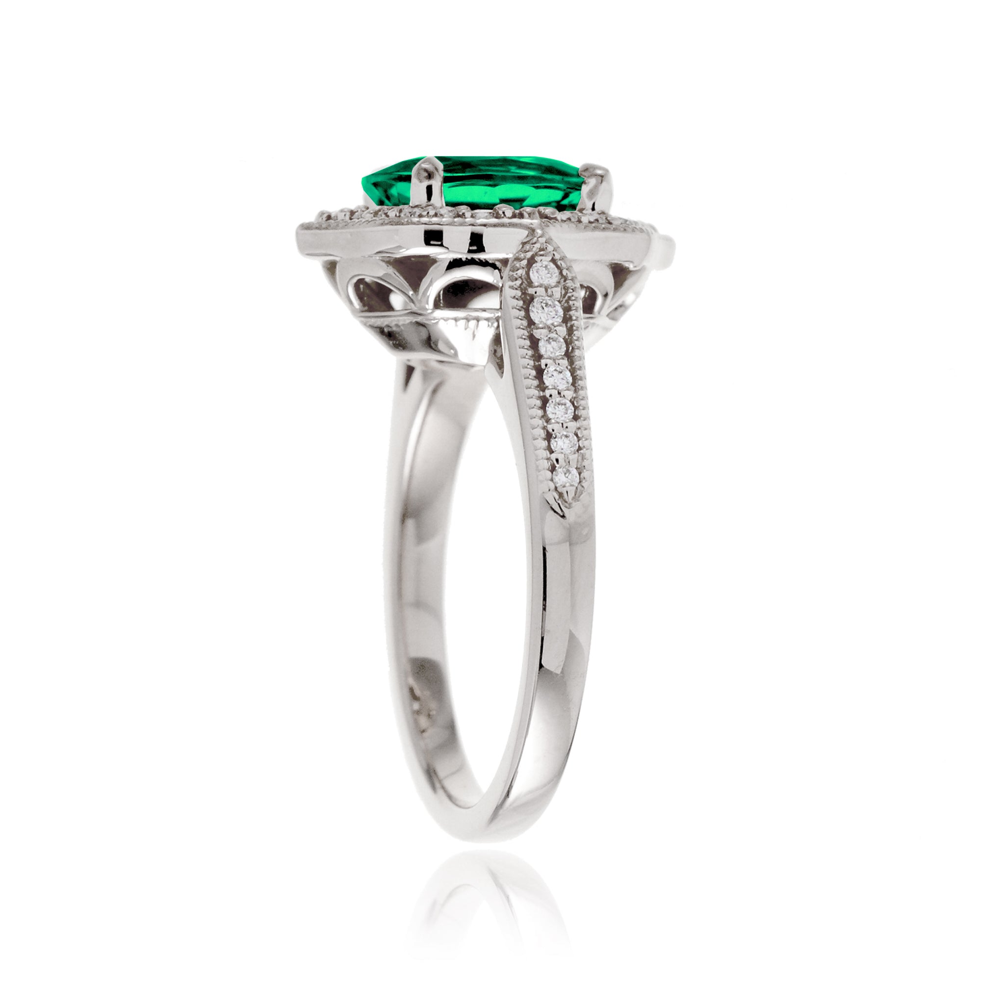 Elegant Oval Emerald and Diamond Ring in White Gold Platinum