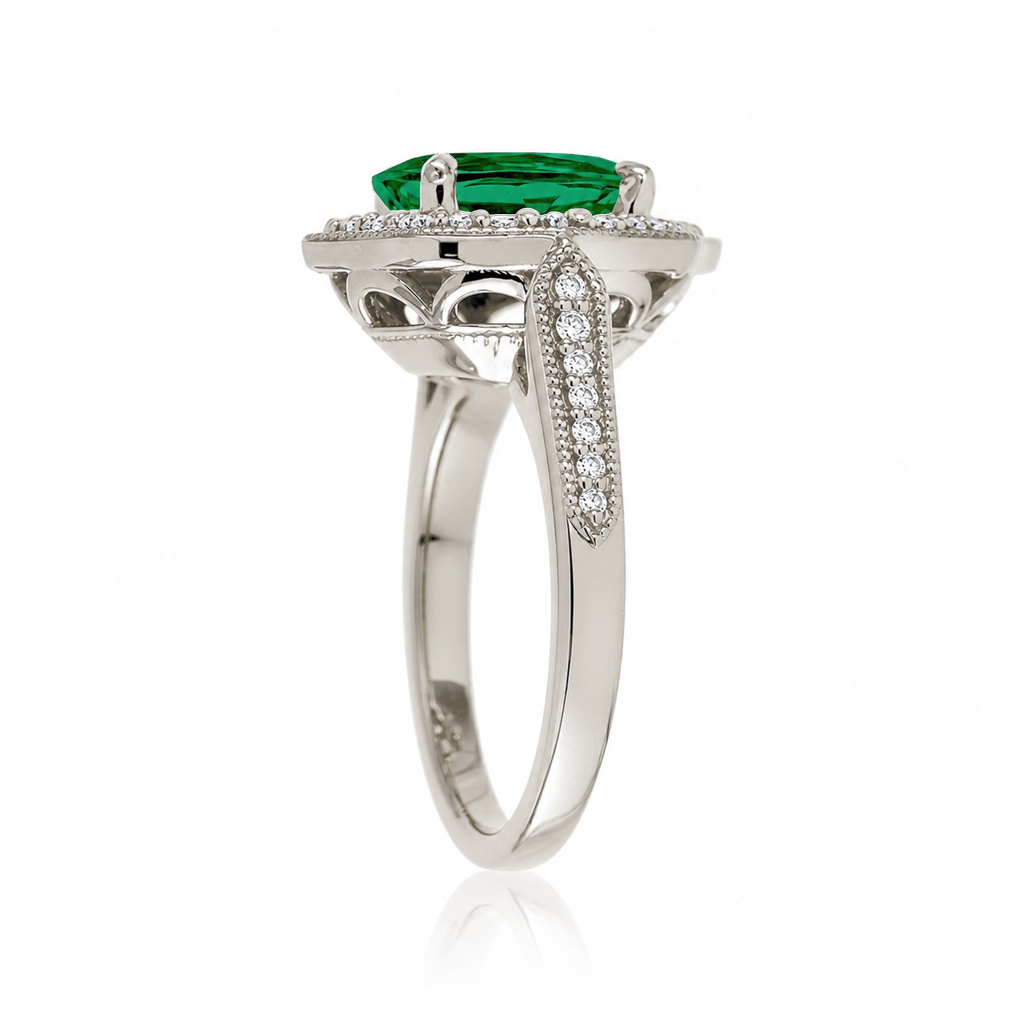 Elegant Oval Emerald and Diamond Ring in White Gold Platinum