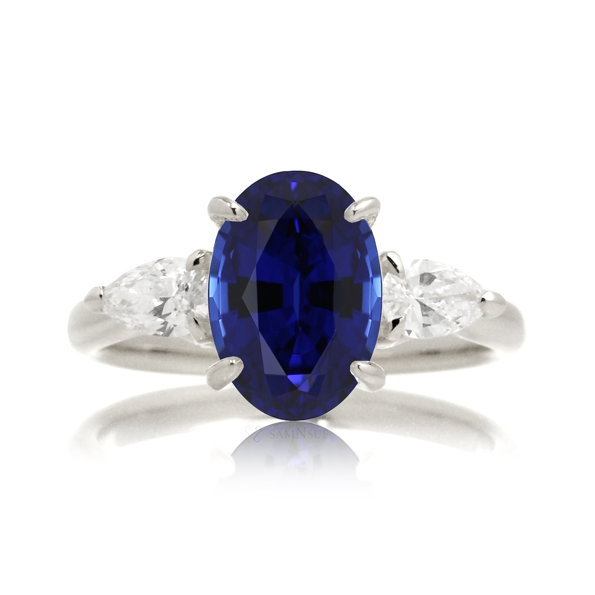 Oval sapphire pear diamond ring white gold