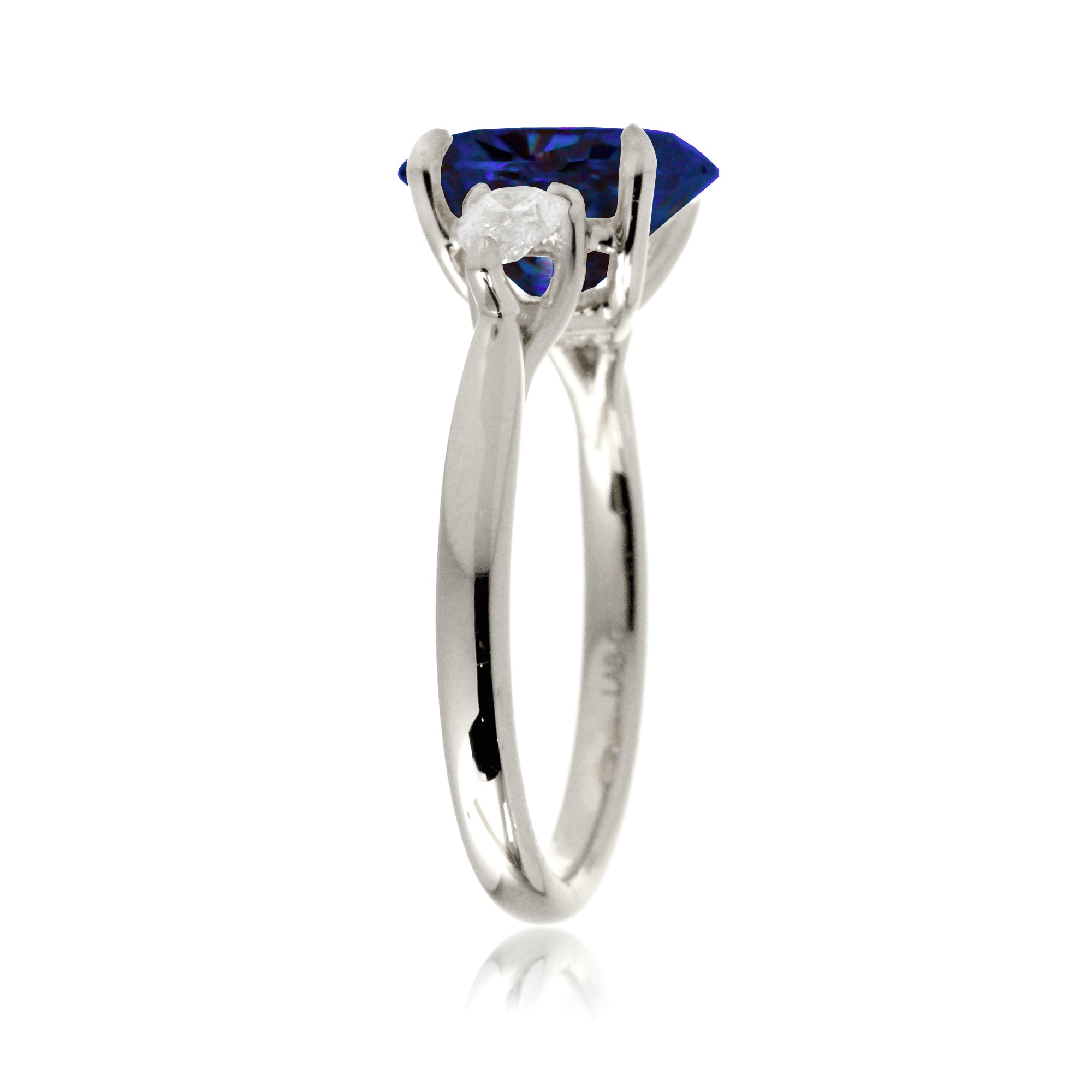 Oval sapphire pear diamond ring white gold