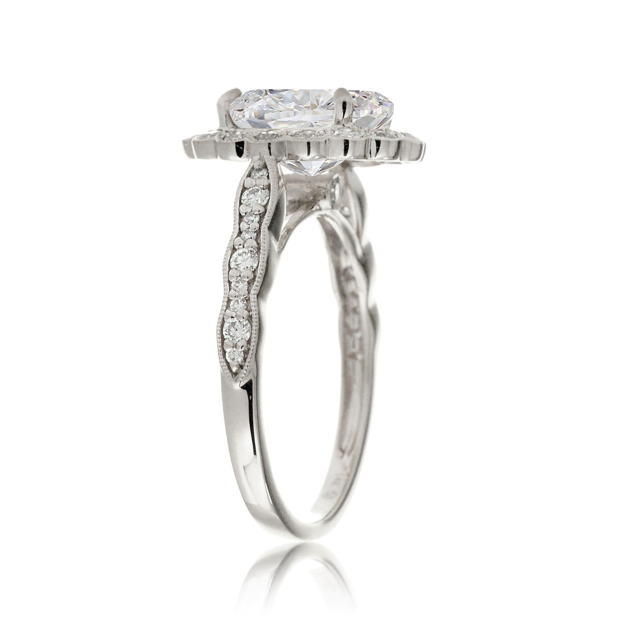 Scallop design oval diamond engagement ring with vintage accent in white gold