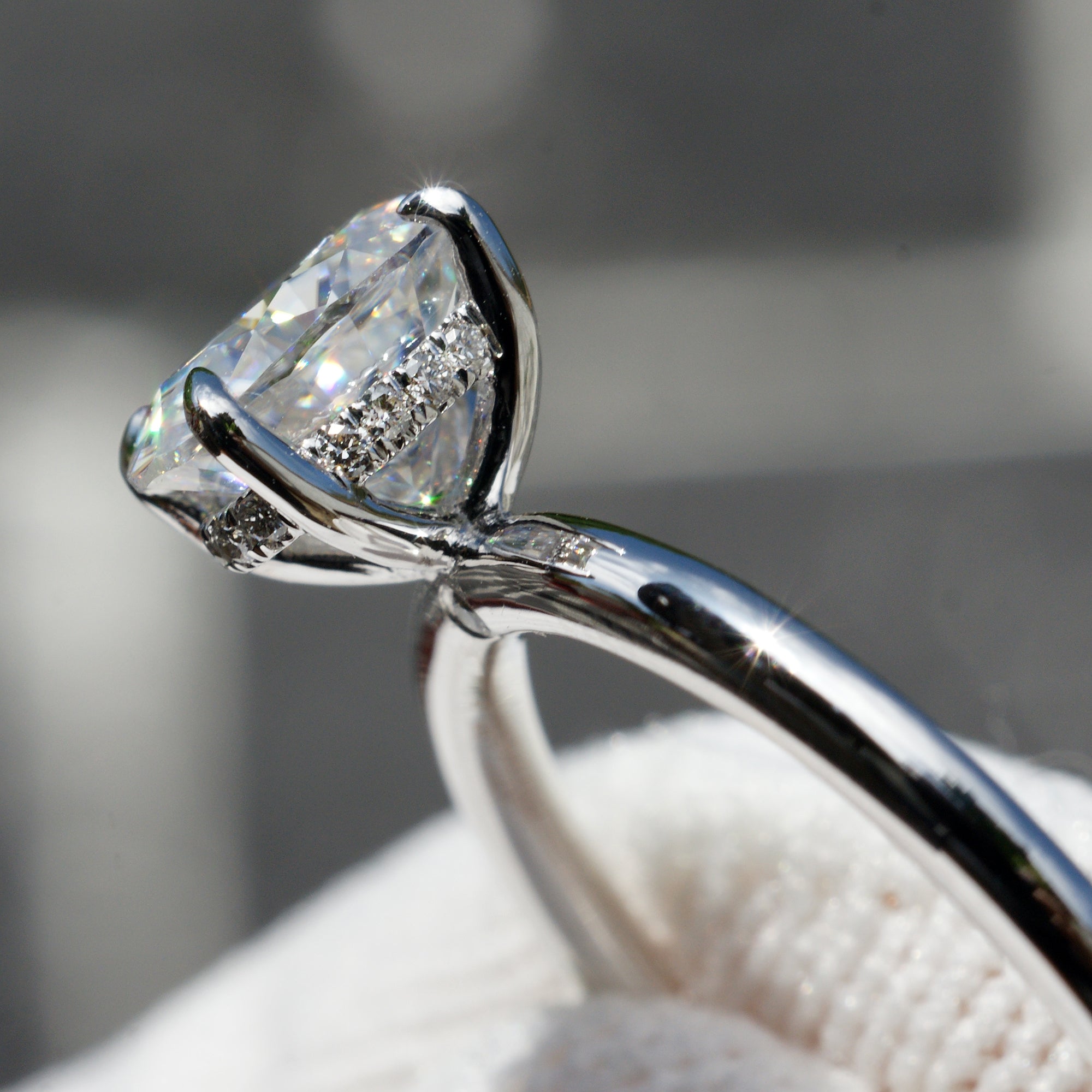 The Lucy Oval Moissanite Ring 8x6mm 18k white gold