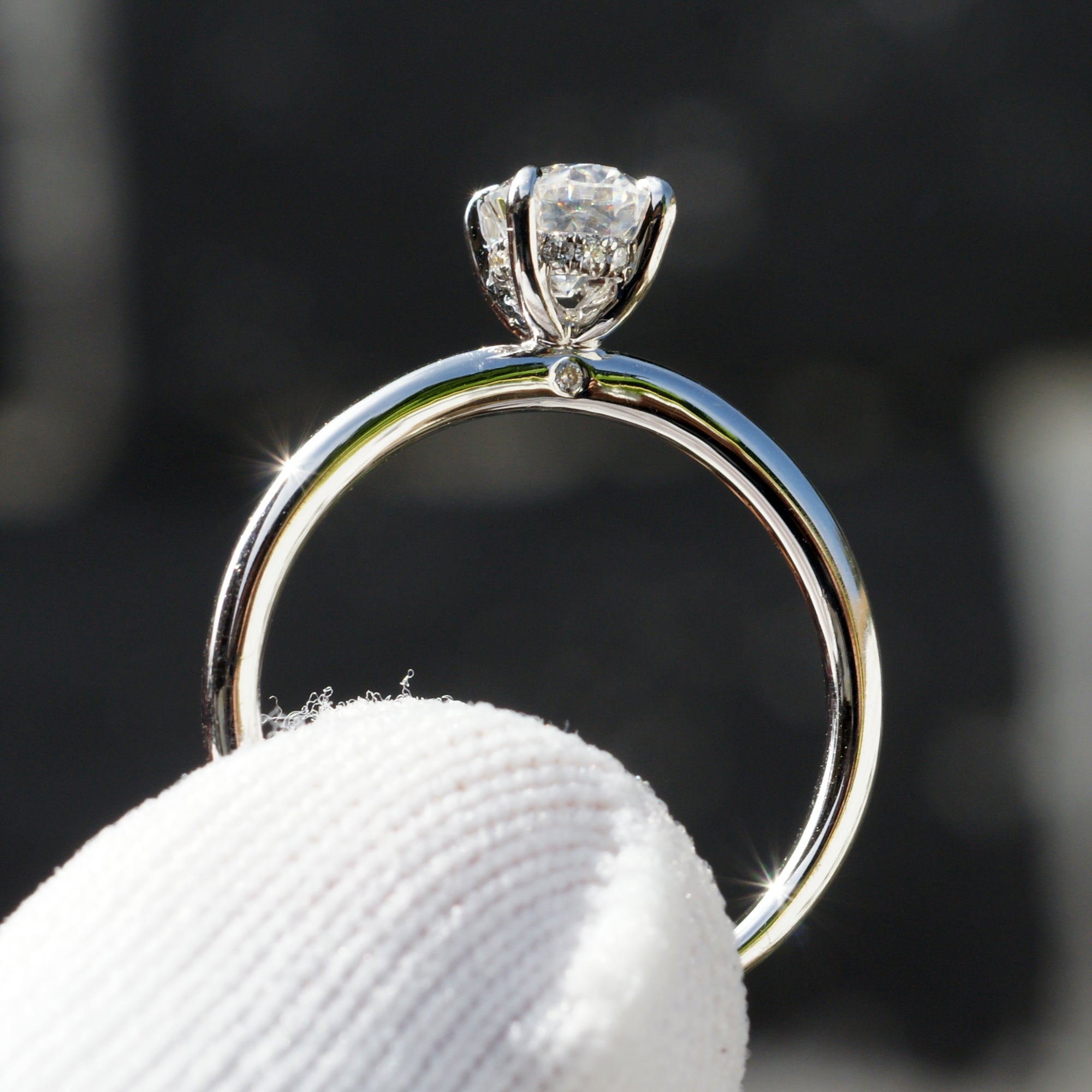 The Lucy Oval Moissanite Ring 7x5mm 18k white gold