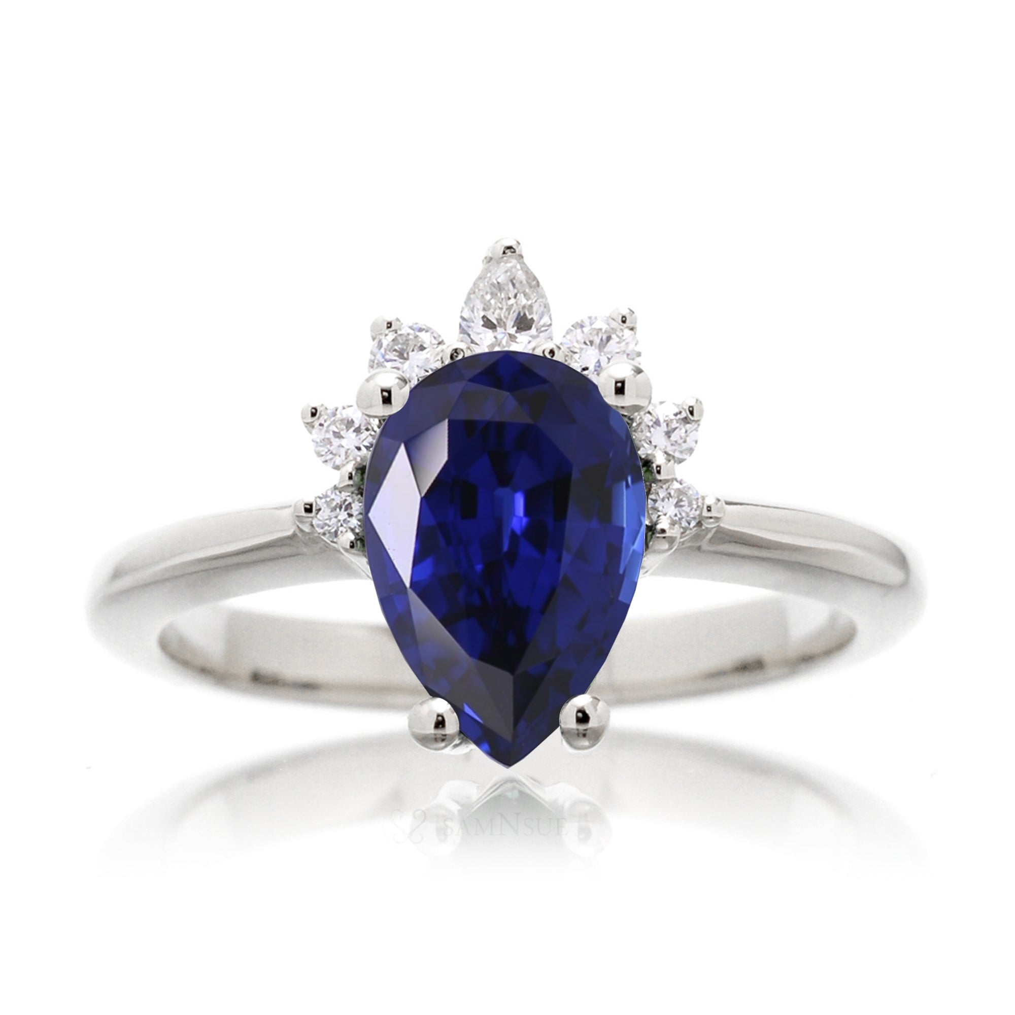 Pear blue sapphire solitaire with half diamond halo and solid band white gold