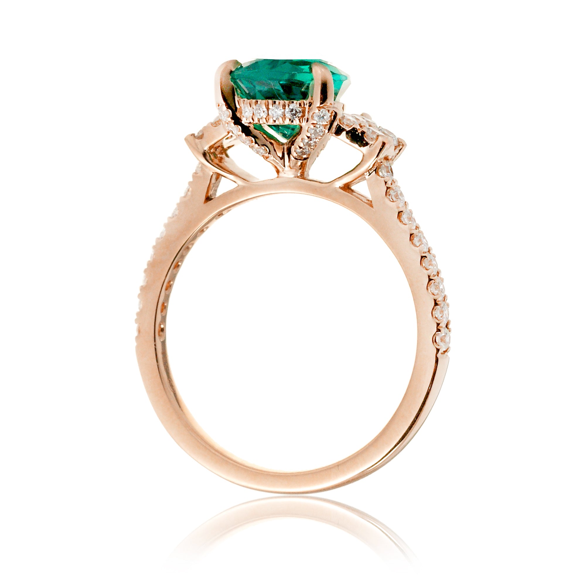 Pear emerald diamond three stone ring in rose gold the Taylor
