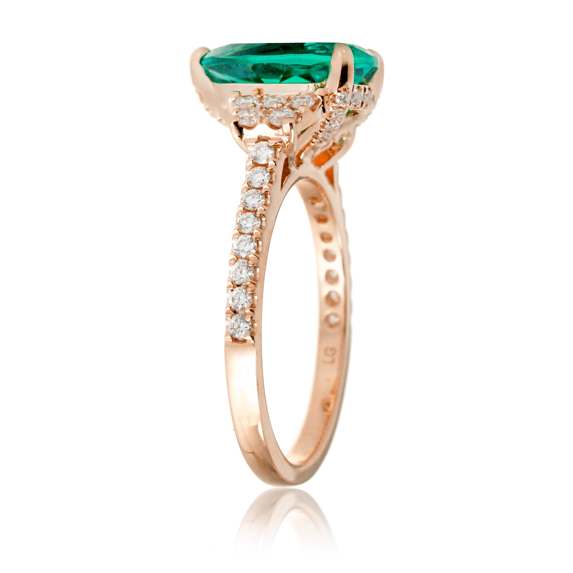 Pear emerald diamond three stone ring in rose gold the Taylor