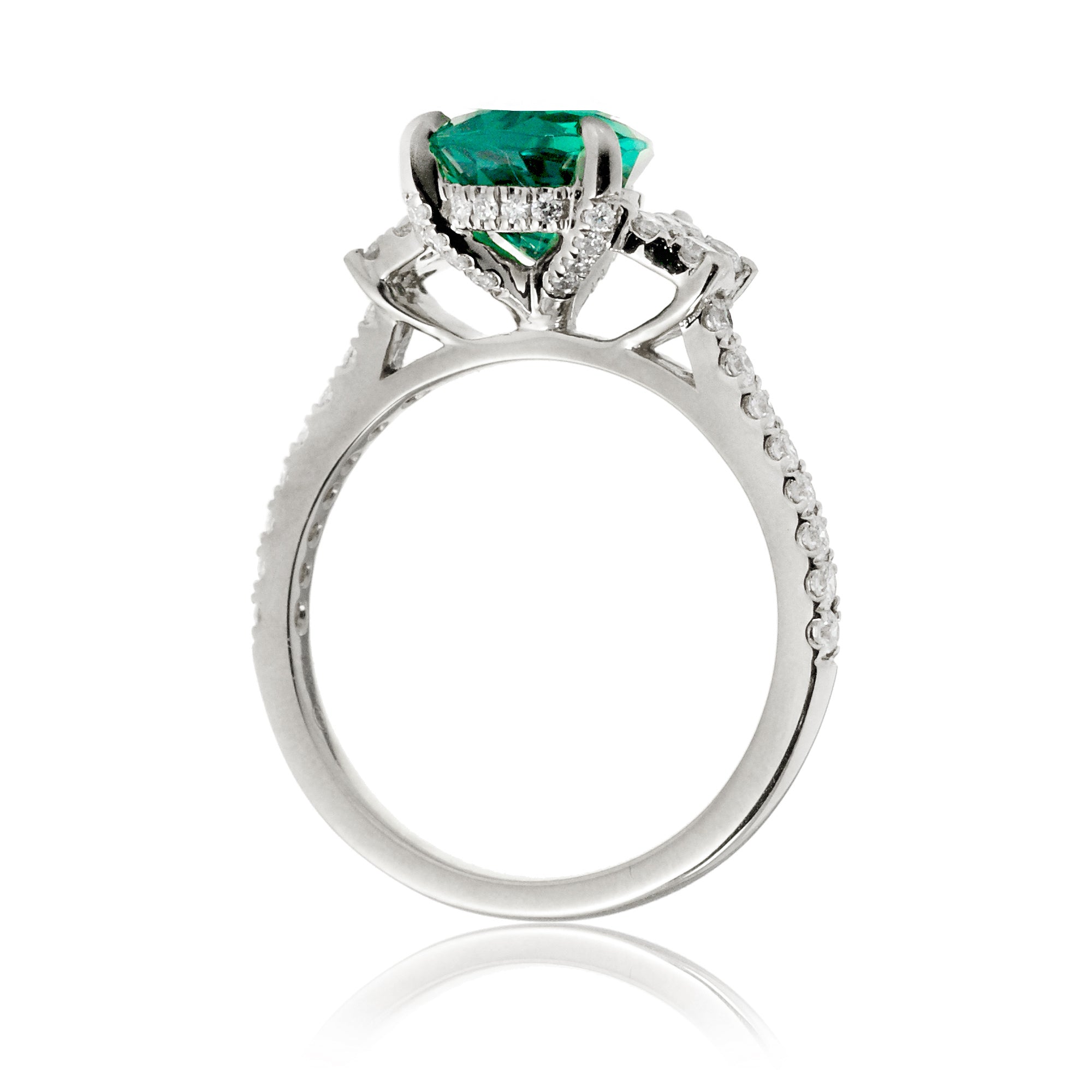 Pear emerald diamond three stone ring in white gold the Taylor