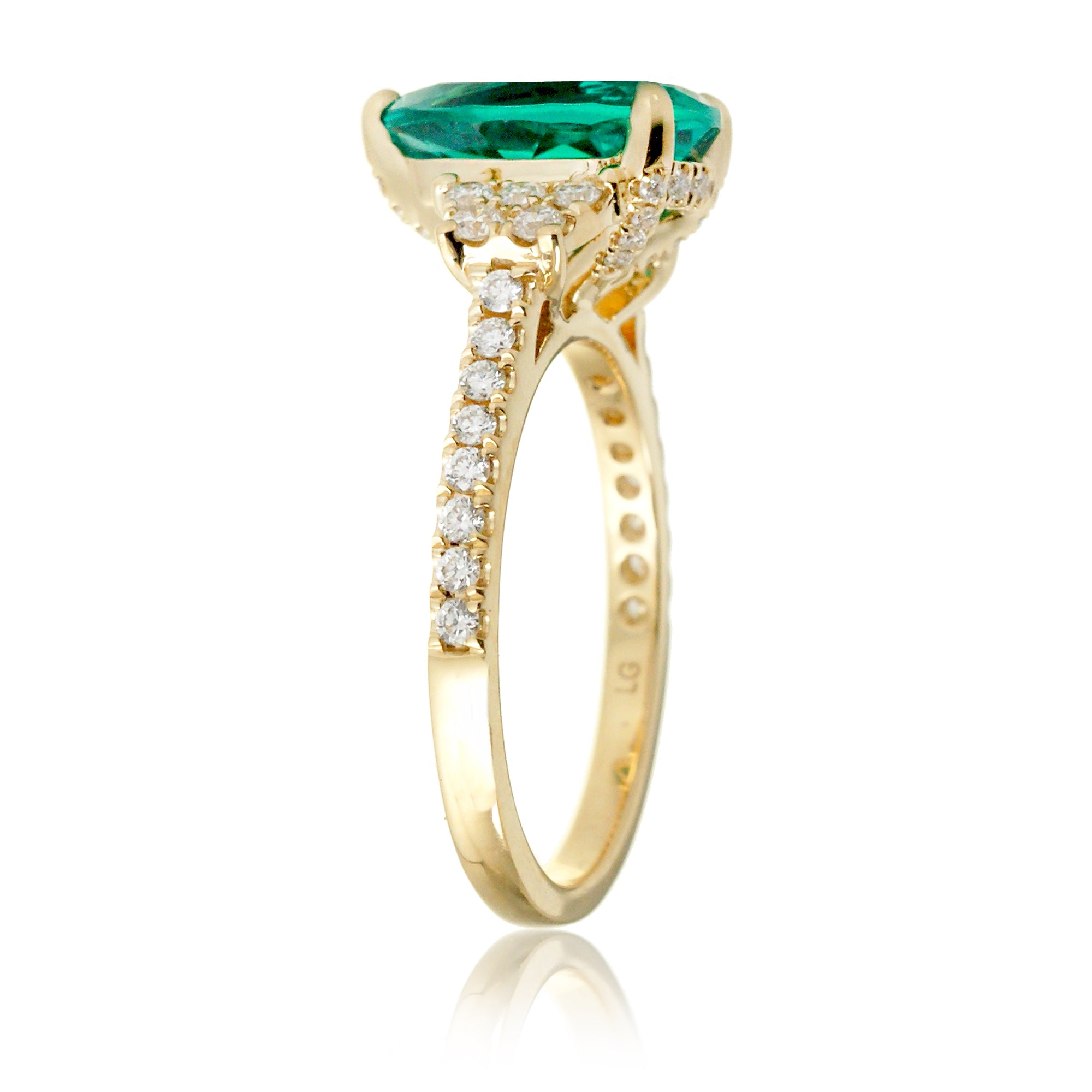 Pear emerald diamond three stone ring in yellow gold the Taylor