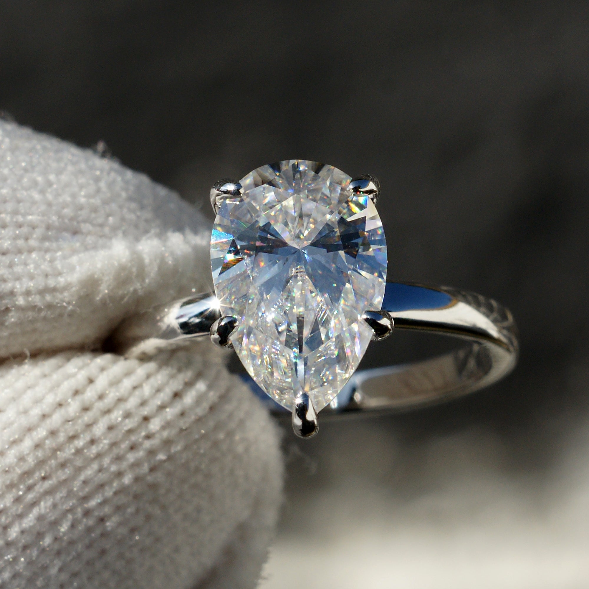 Solitaire moissanite engagement ring pear 3ct white gold