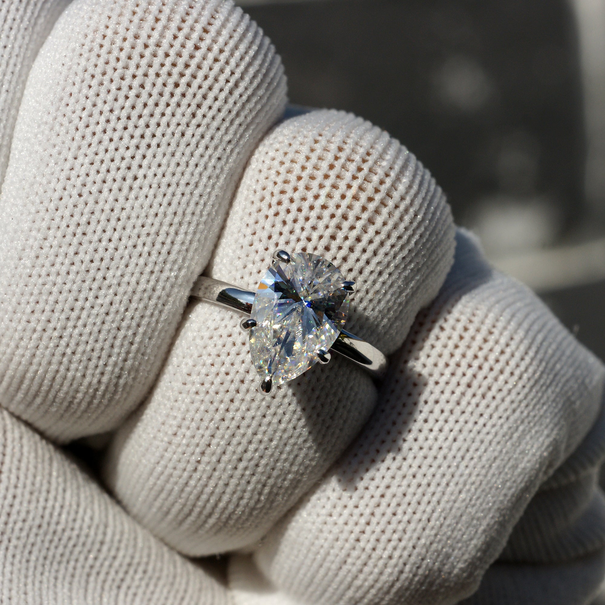 Solitaire moissanite engagement ring pear 3ct white gold