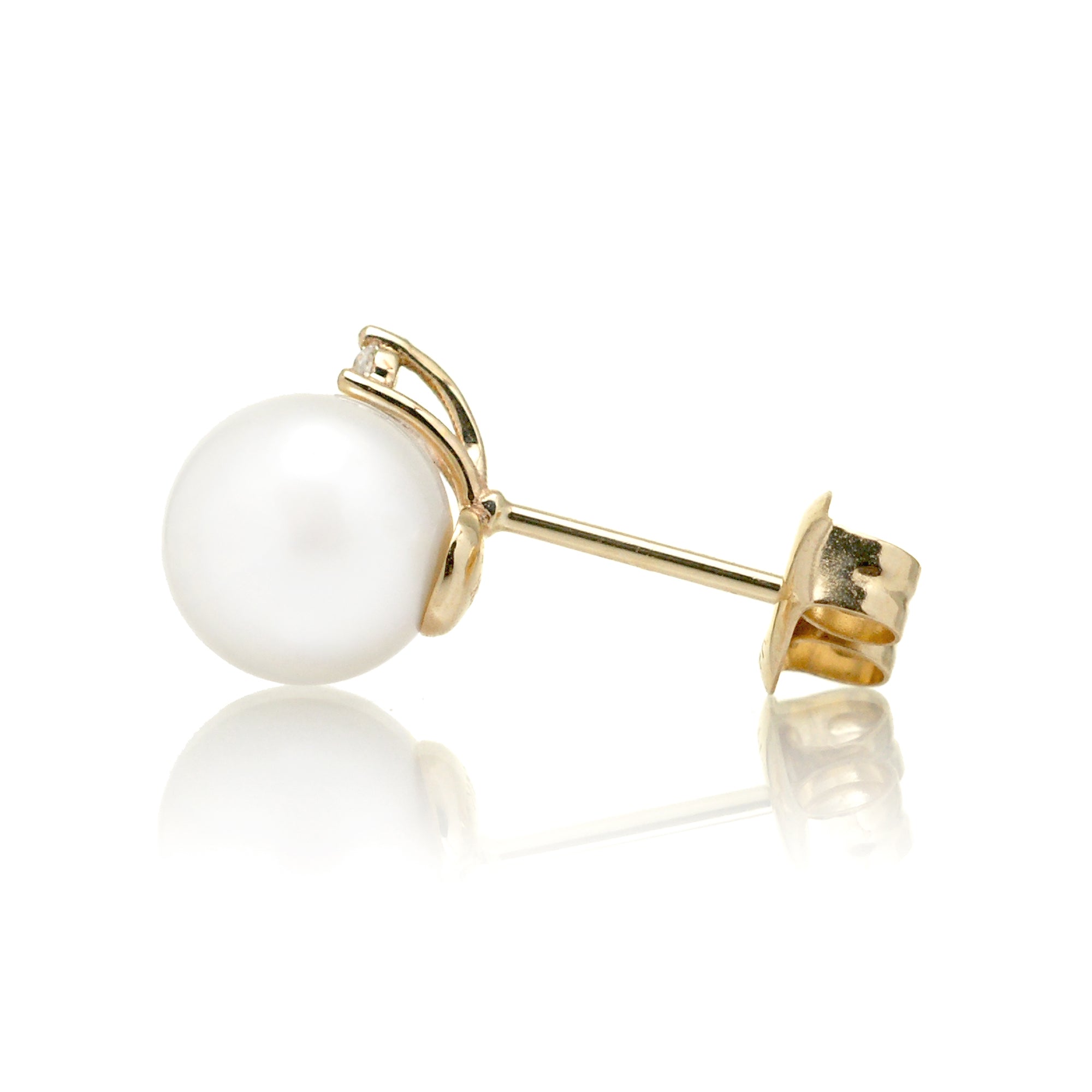 akoya pearl stud earrings with diamonds in yellow gold