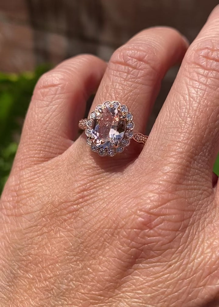 Morganite Engagement Ring in Rose Gold Oval Scallop Diamond Halo on Hand