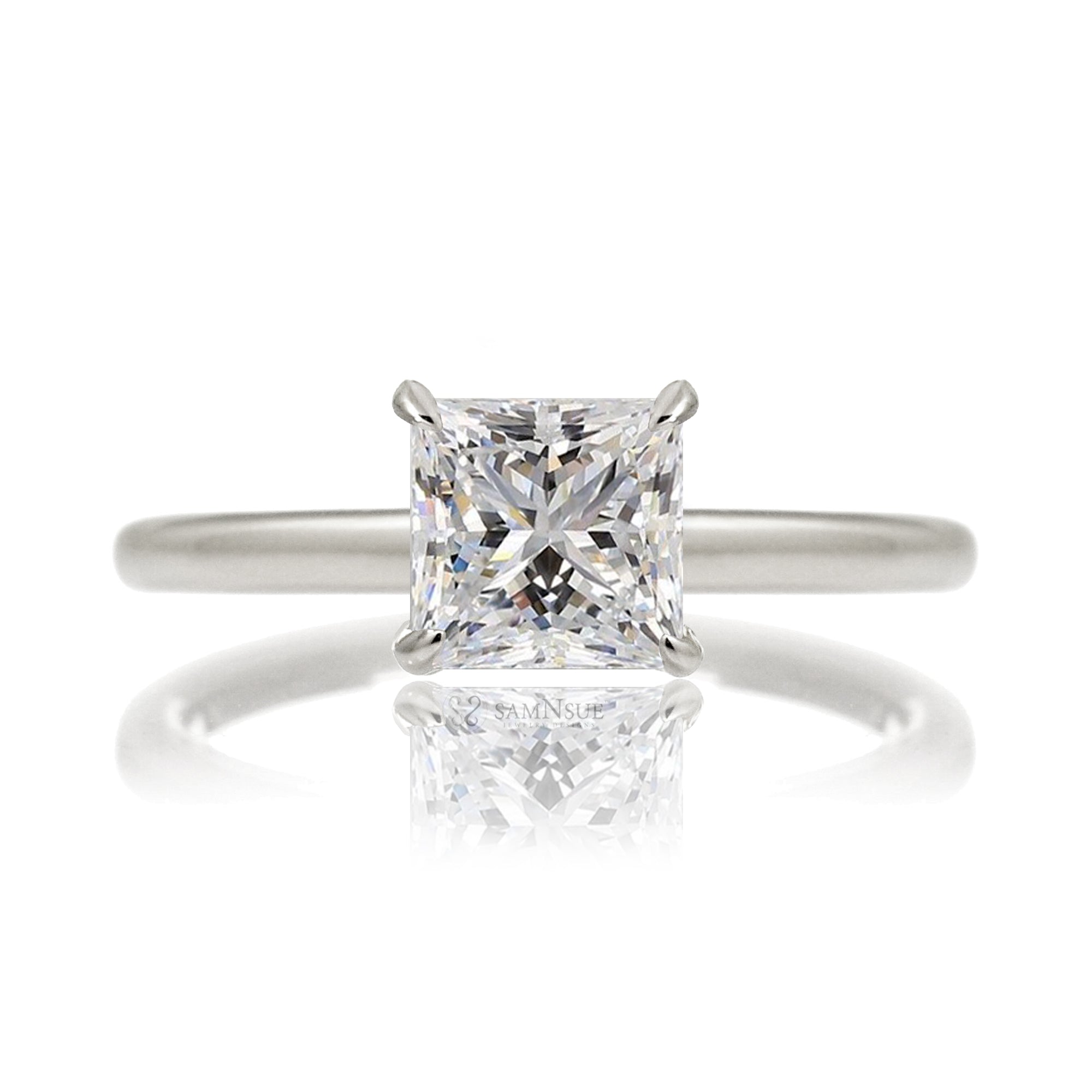 Princess cut solitaire diamond engagement ring with a hidden halo and solid polished band in white gold