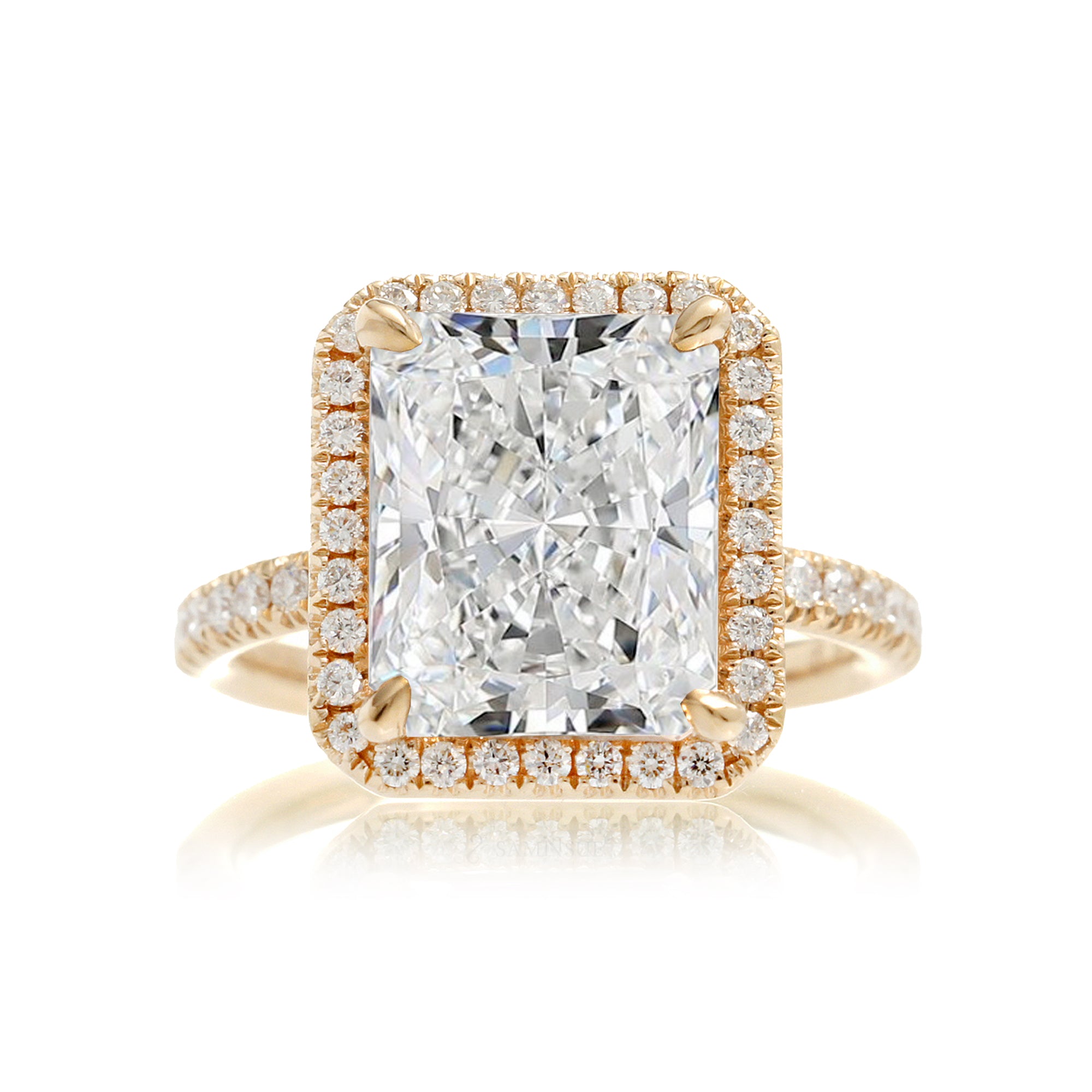 Radiant cut engagement ring with diamond halo and band the Drenched yellow gold