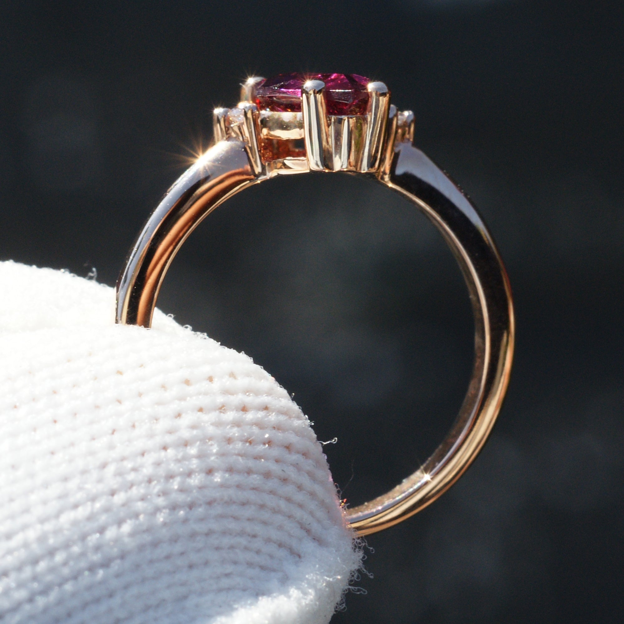 Rhodolite garnet pear half diamond halo ring in rose gold