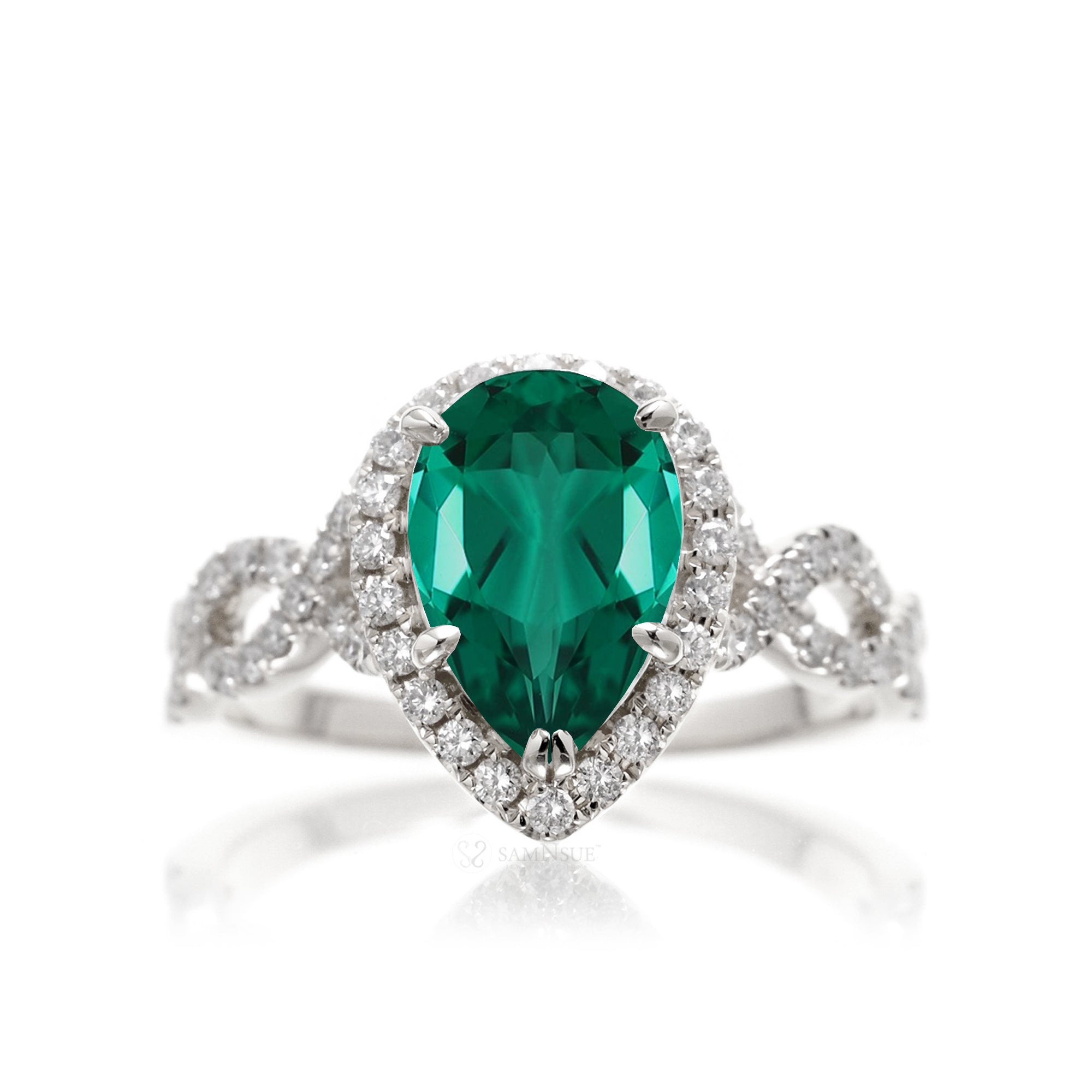 pear emerald diamond halo ring with twisted band white gold