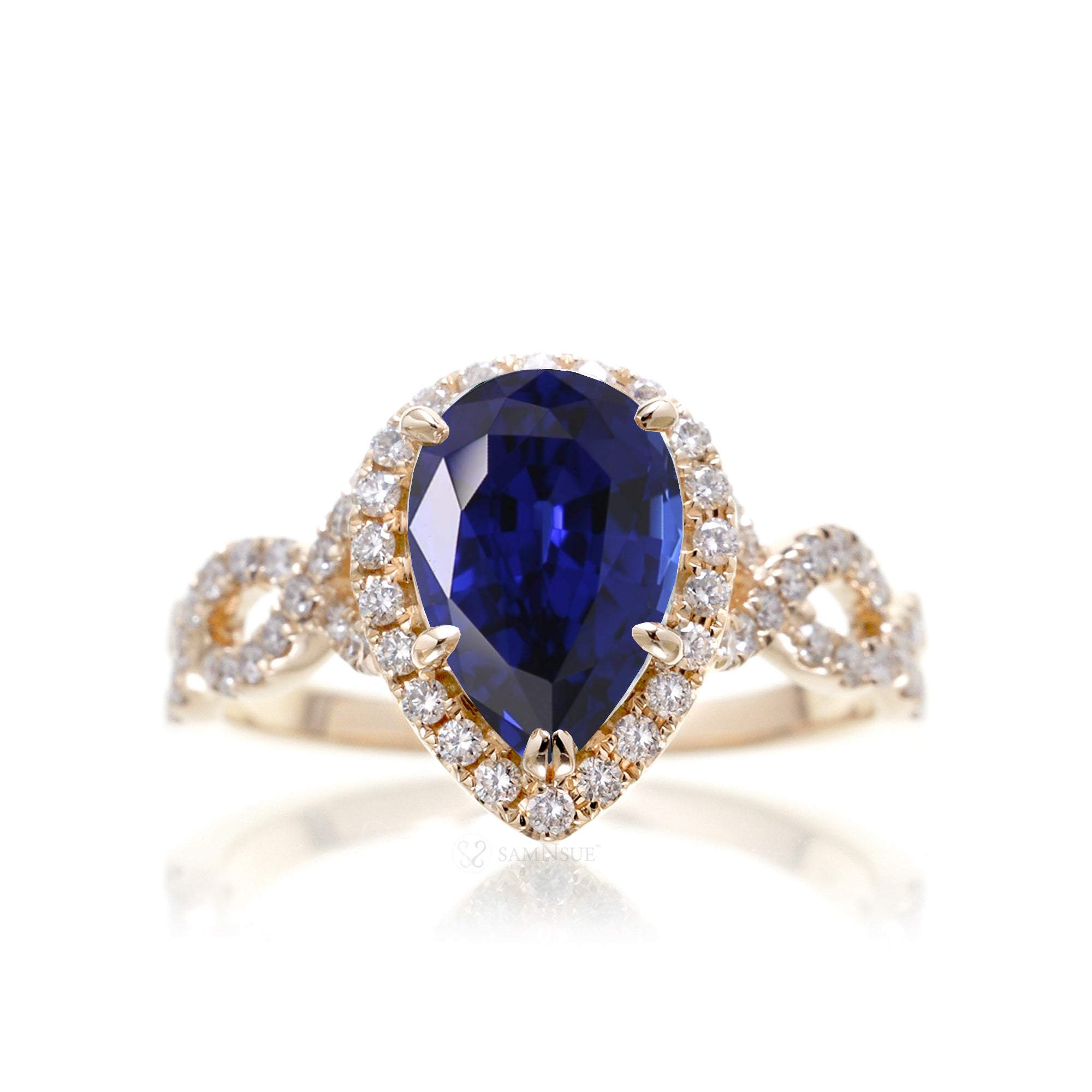 Sapphire ring pear diamond halo twisted band yellow gold