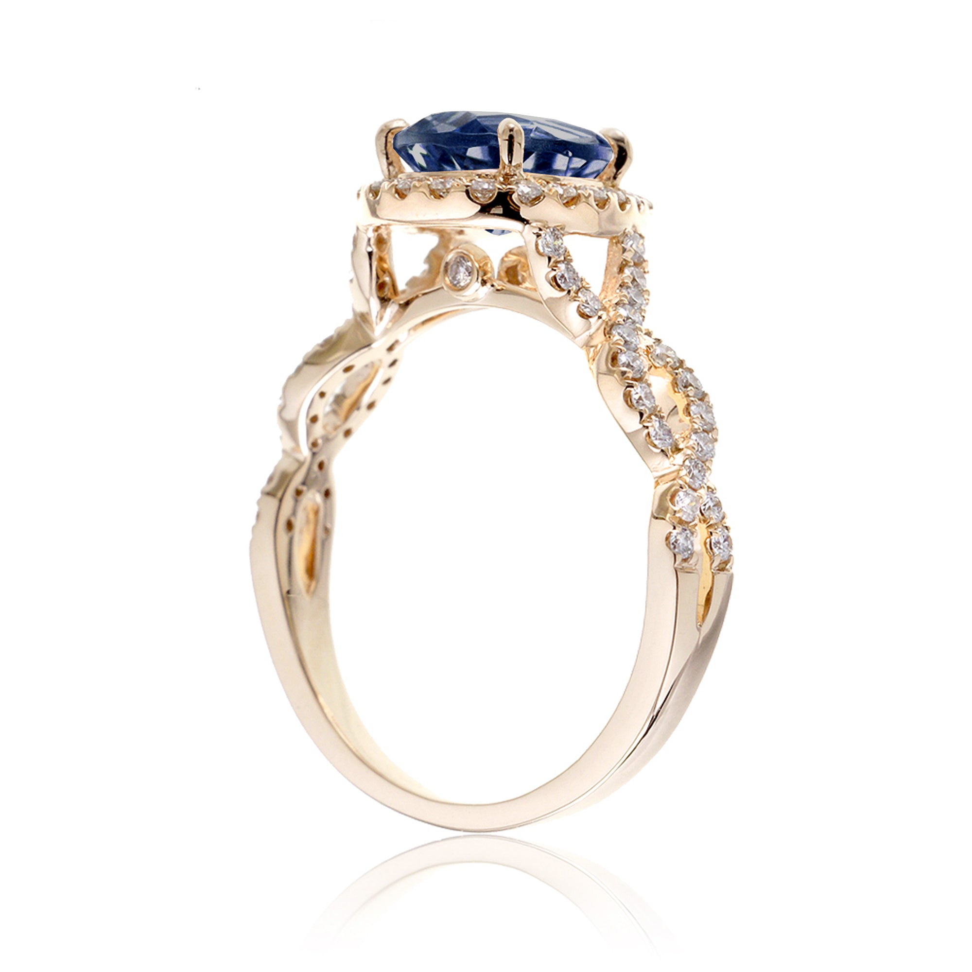 Sapphire ring pear diamond halo twisted band yellow gold