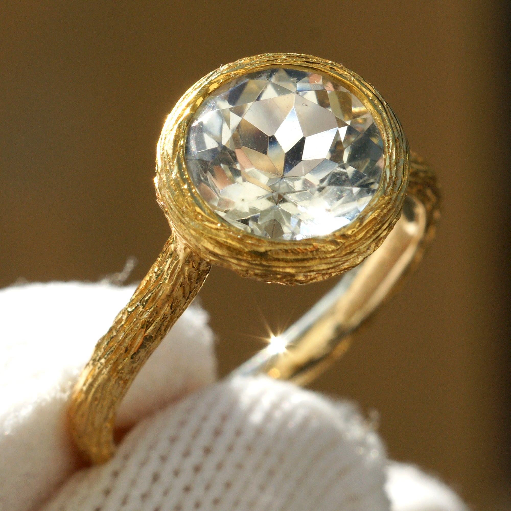 Prasiolite green amethyst solitaire bezel wood grain ring in yellow gold