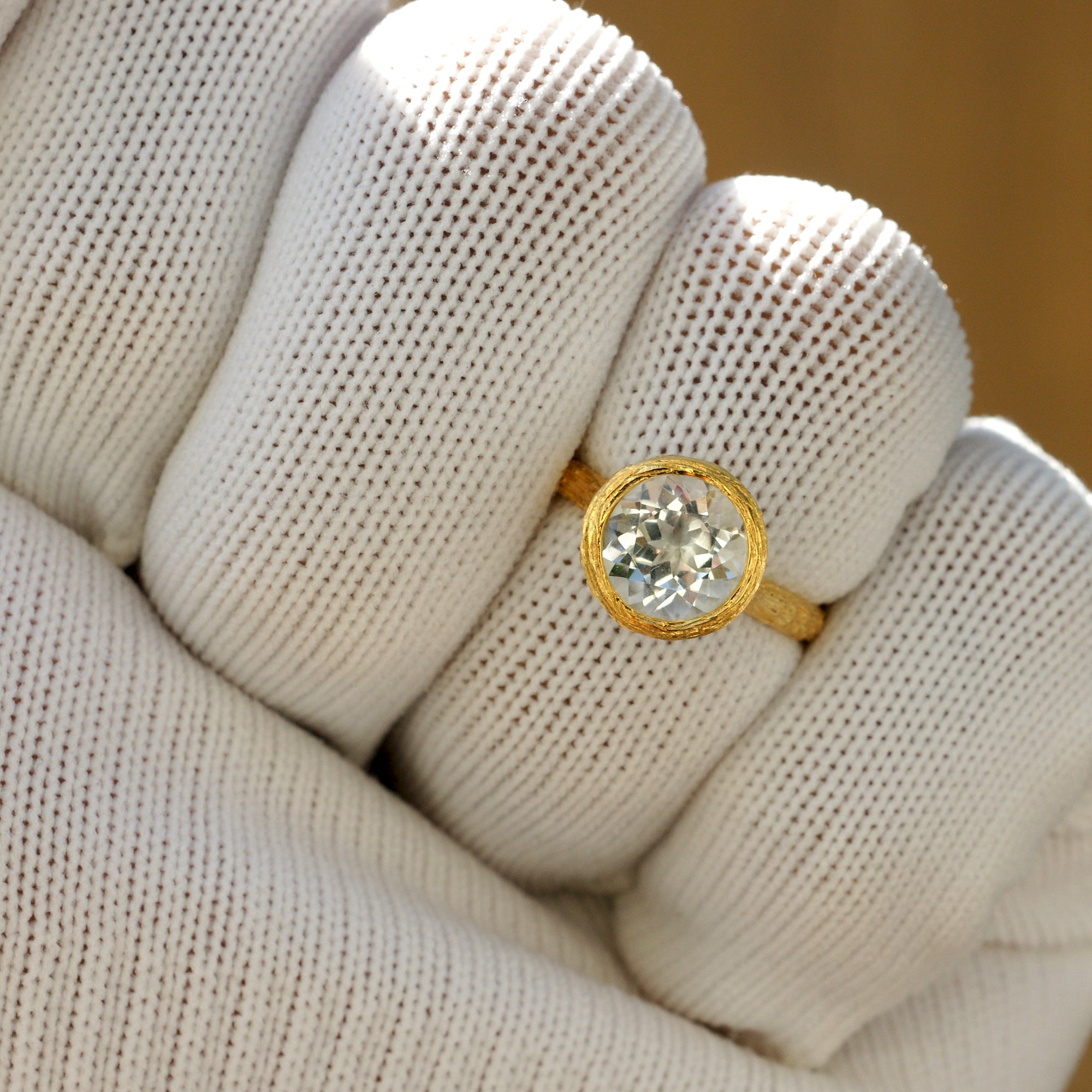 Prasiolite green amethyst solitaire bezel wood grain ring in yellow gold
