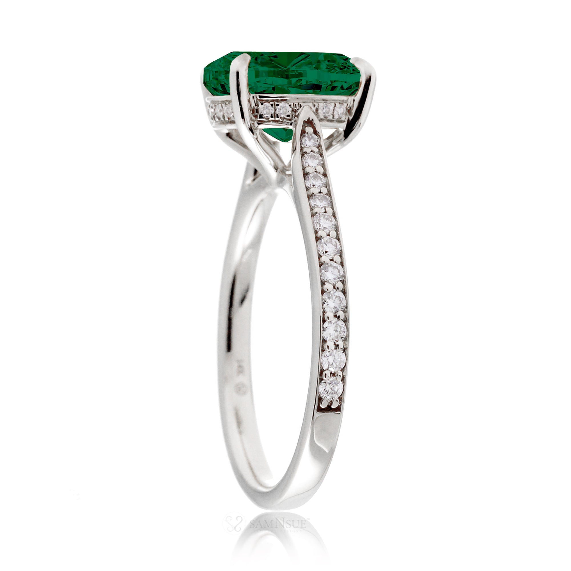 Round green emerald solitaire engagement ring with a diamond band and hidden halo - the emily in white gold