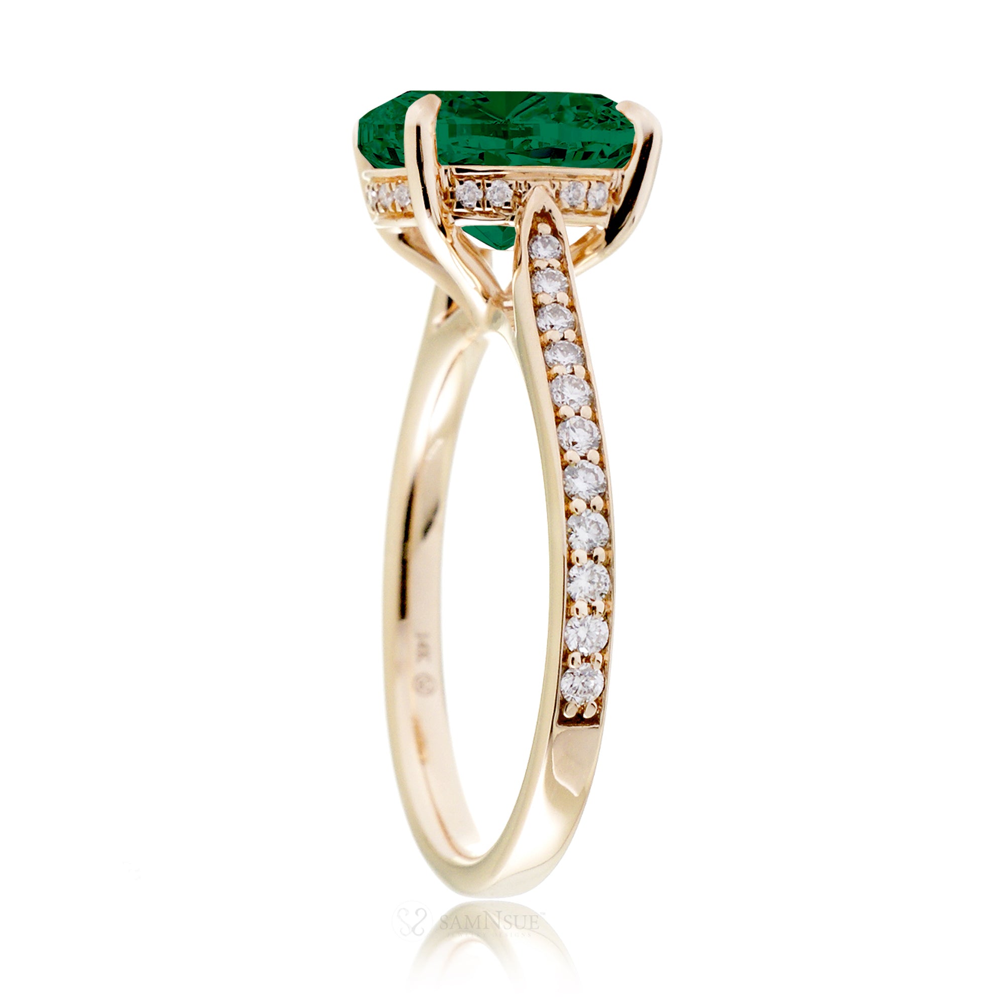 Round green emerald solitaire engagement ring with a diamond band and hidden halo - the emily in yellow gold