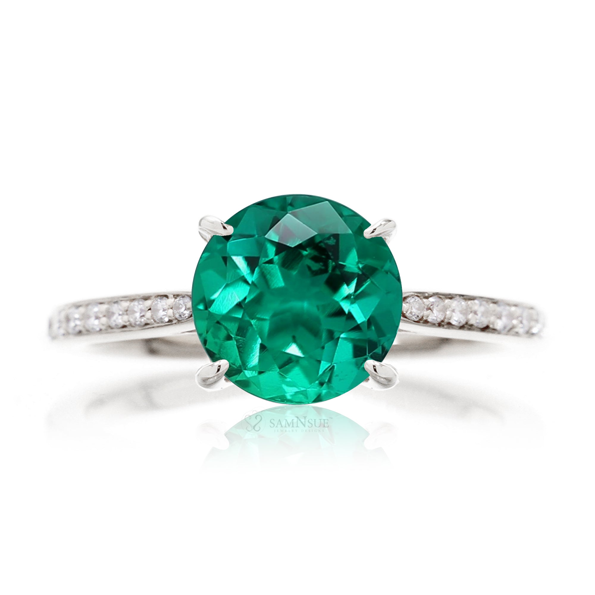 Round green emerald solitaire engagement ring with a diamond band - the emily in white gold