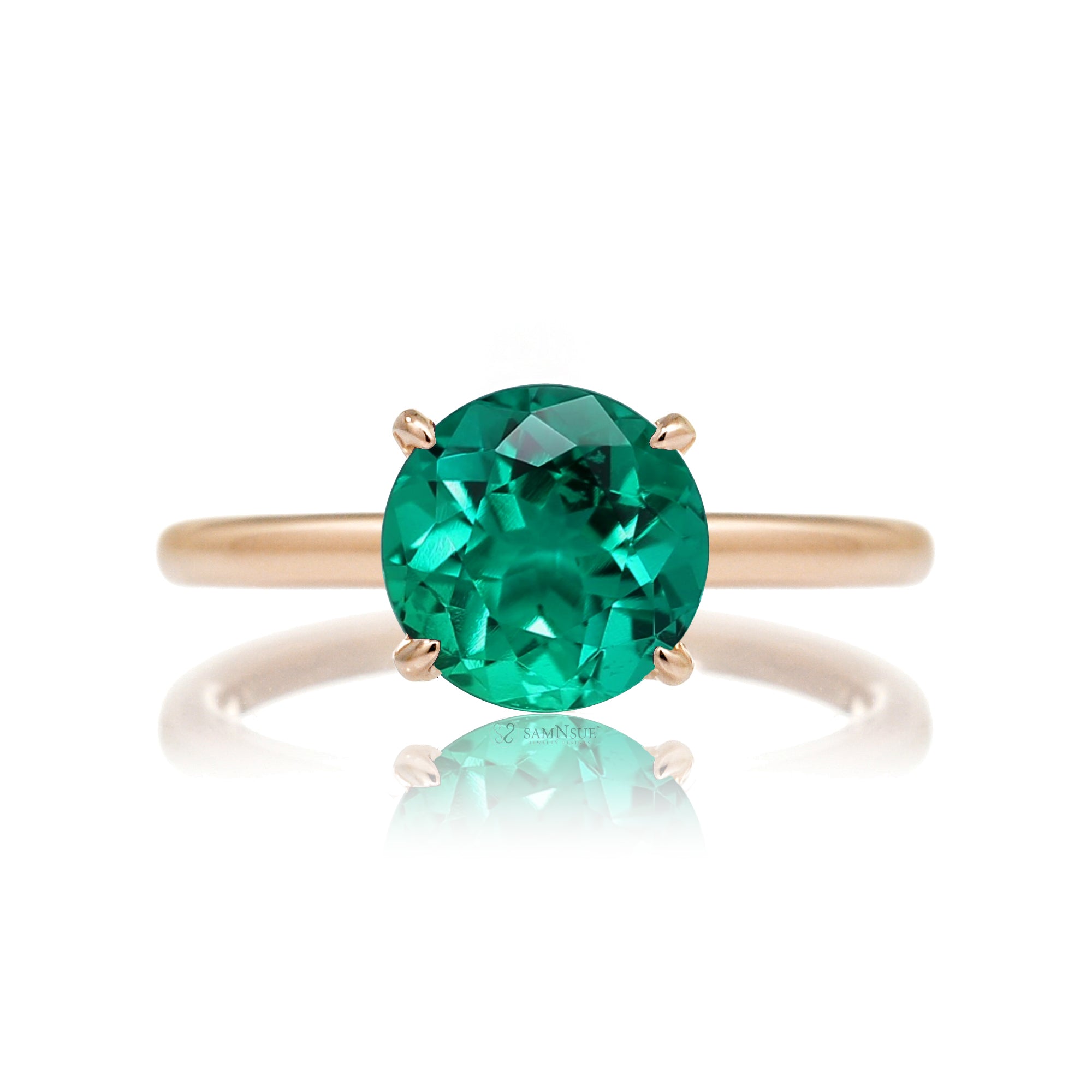 Round cut green emerald ring with diamond hidden halo on rose gold