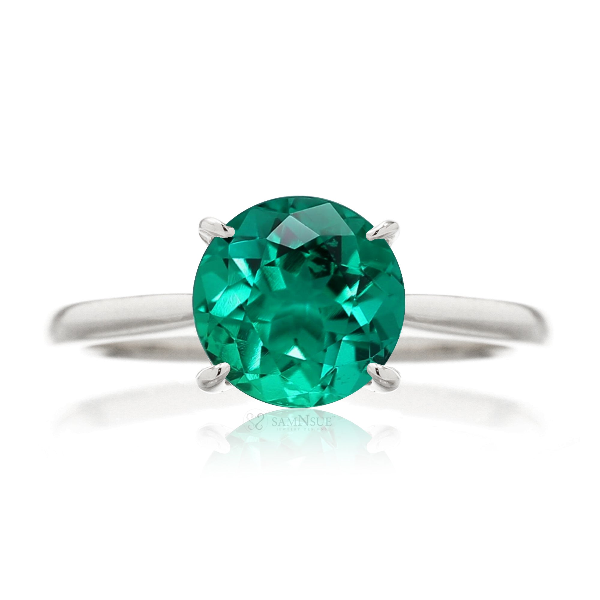 Round green emerald solitaire engagement ring with a solid band - the emily in white gold