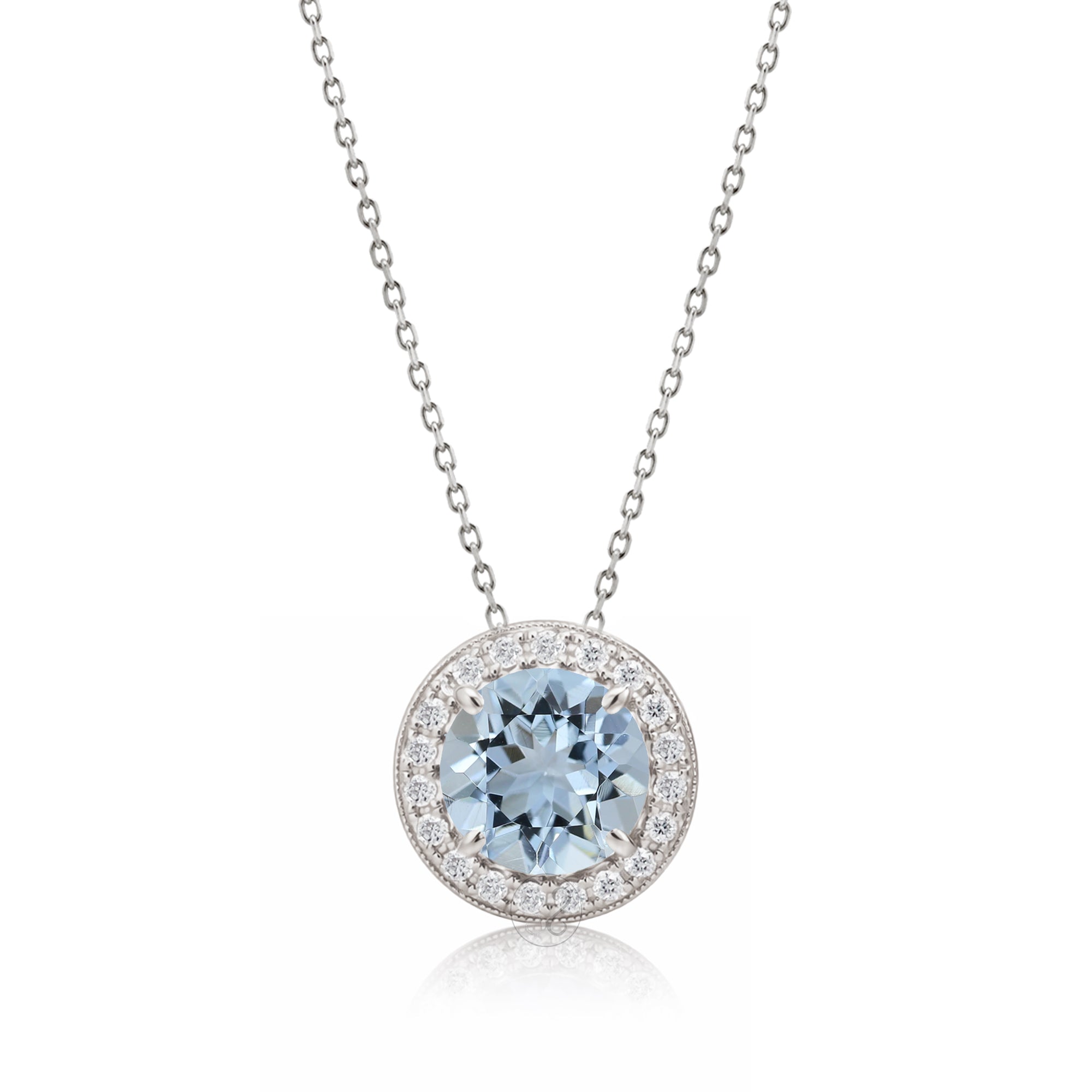 Aquamarine pendant necklace with pave diamond halo with a cable chain in white gold