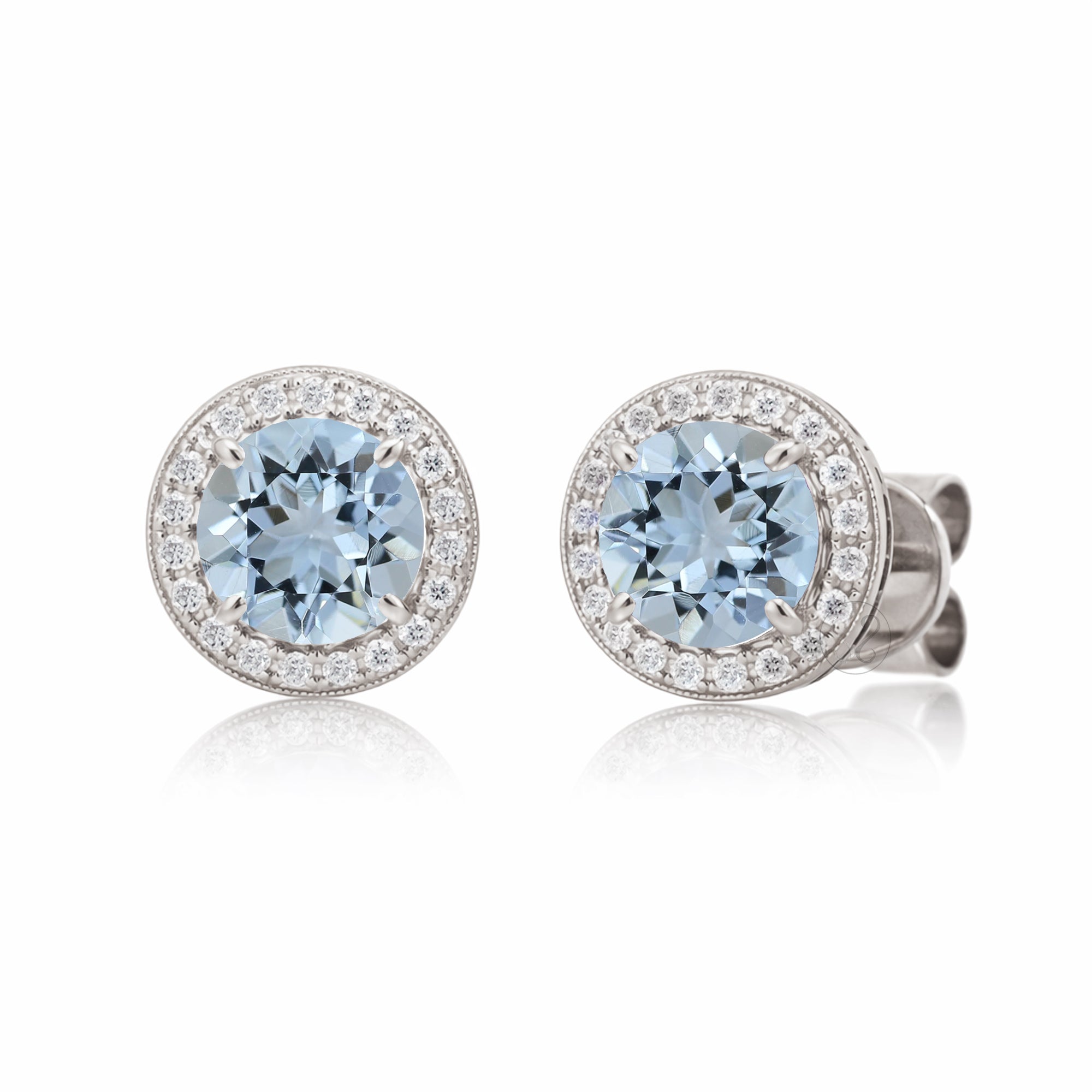 Aquamarine stud earrings with pave diamond halo with push backs in white gold