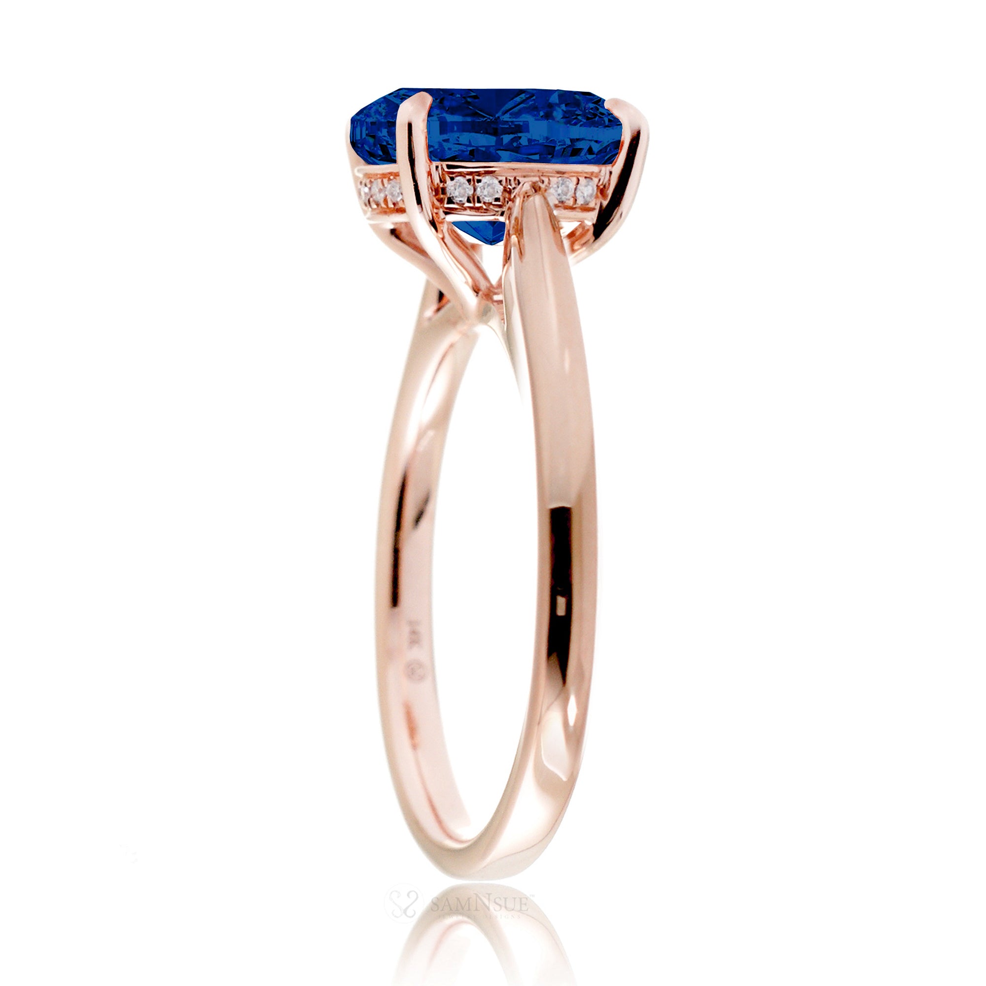 Round blue sapphire engagement ring with a solid band and hidden halo - the Emily rose gold