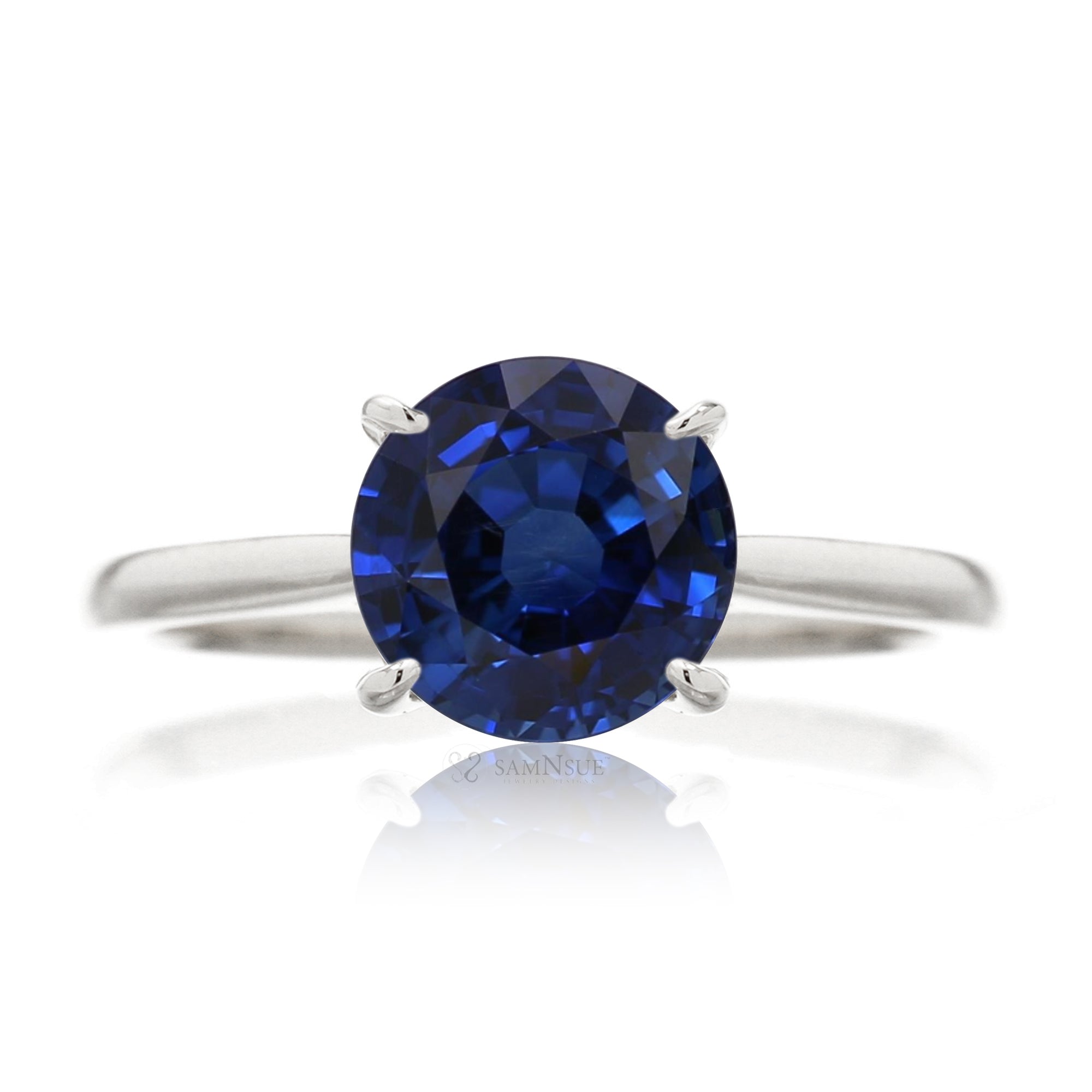 Round blue sapphire engagement ring with a solid band - the Emily white gold