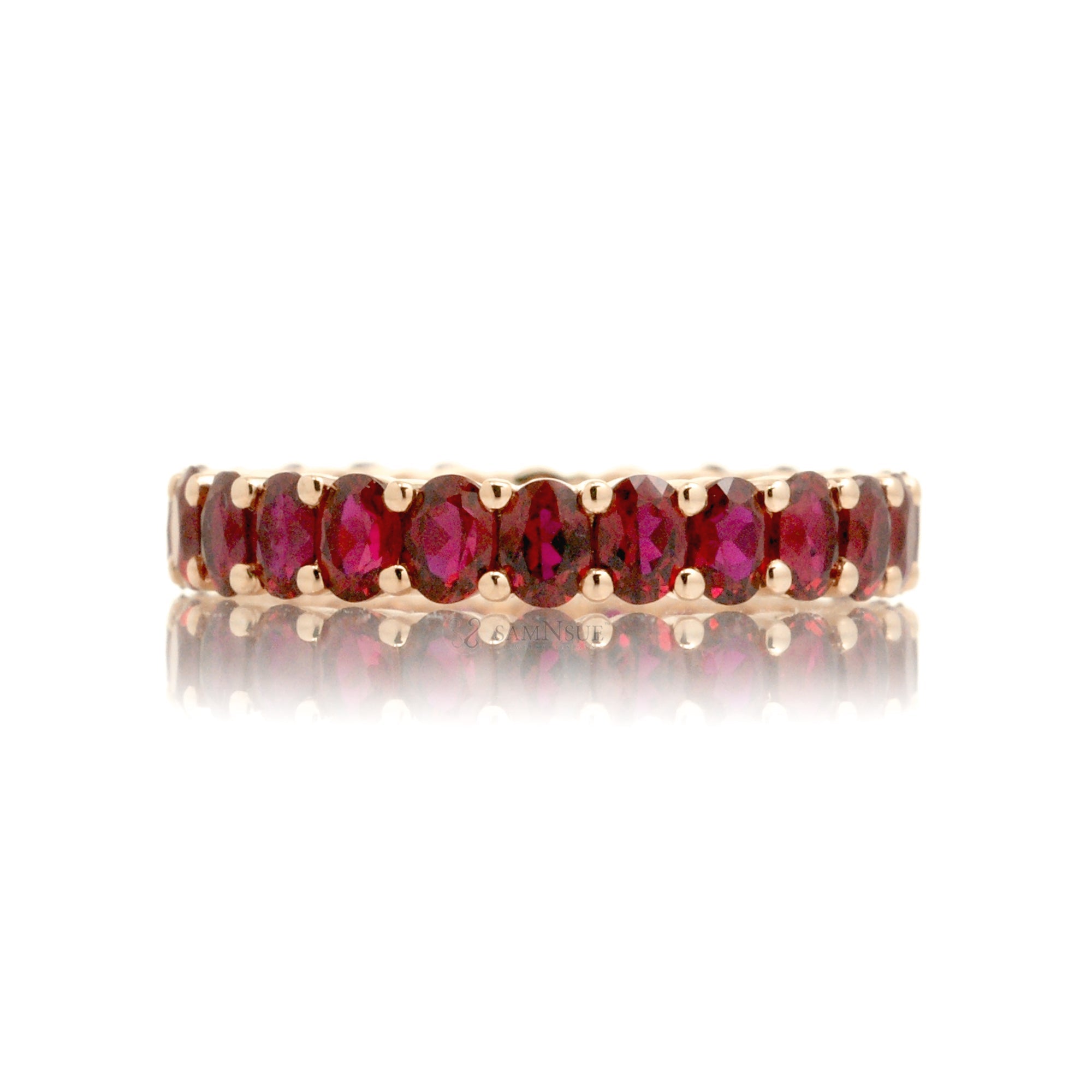 Ruby oval cut eternity wedding band rose gold