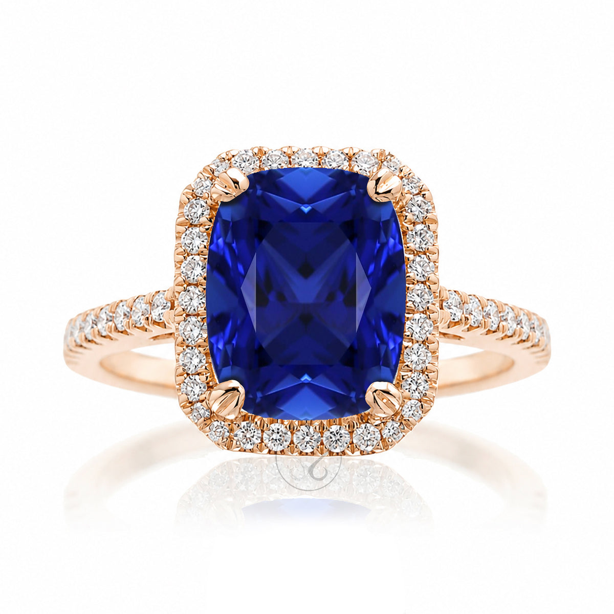 Cushion cut blue sapphire diamond halo ring The Signature in rose gold