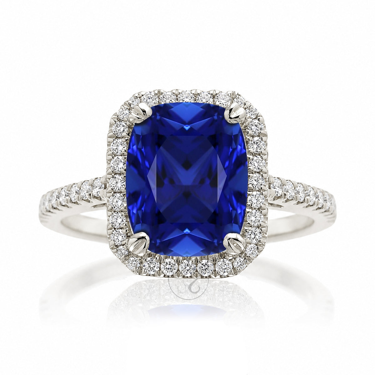Cushion cut blue sapphire diamond halo ring The Signature in white gold