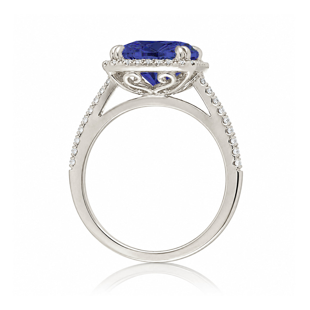 Cushion cut blue sapphire diamond halo ring The Signature in white gold side view