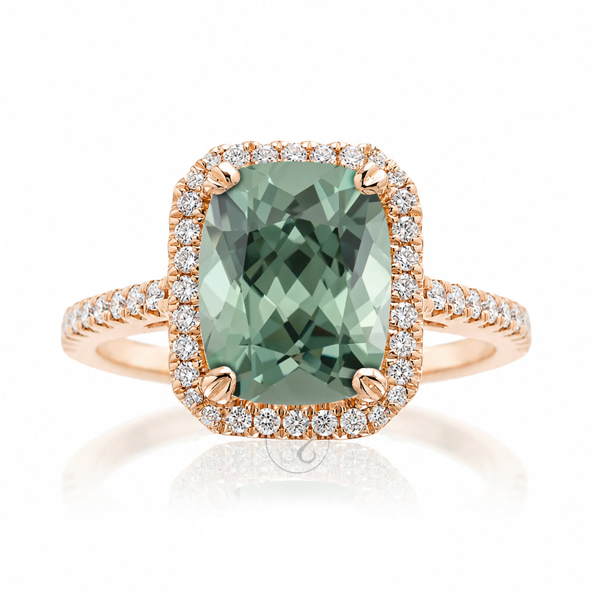 Cushion cut green sapphire engagement ring The signature diamond halo in rose gold