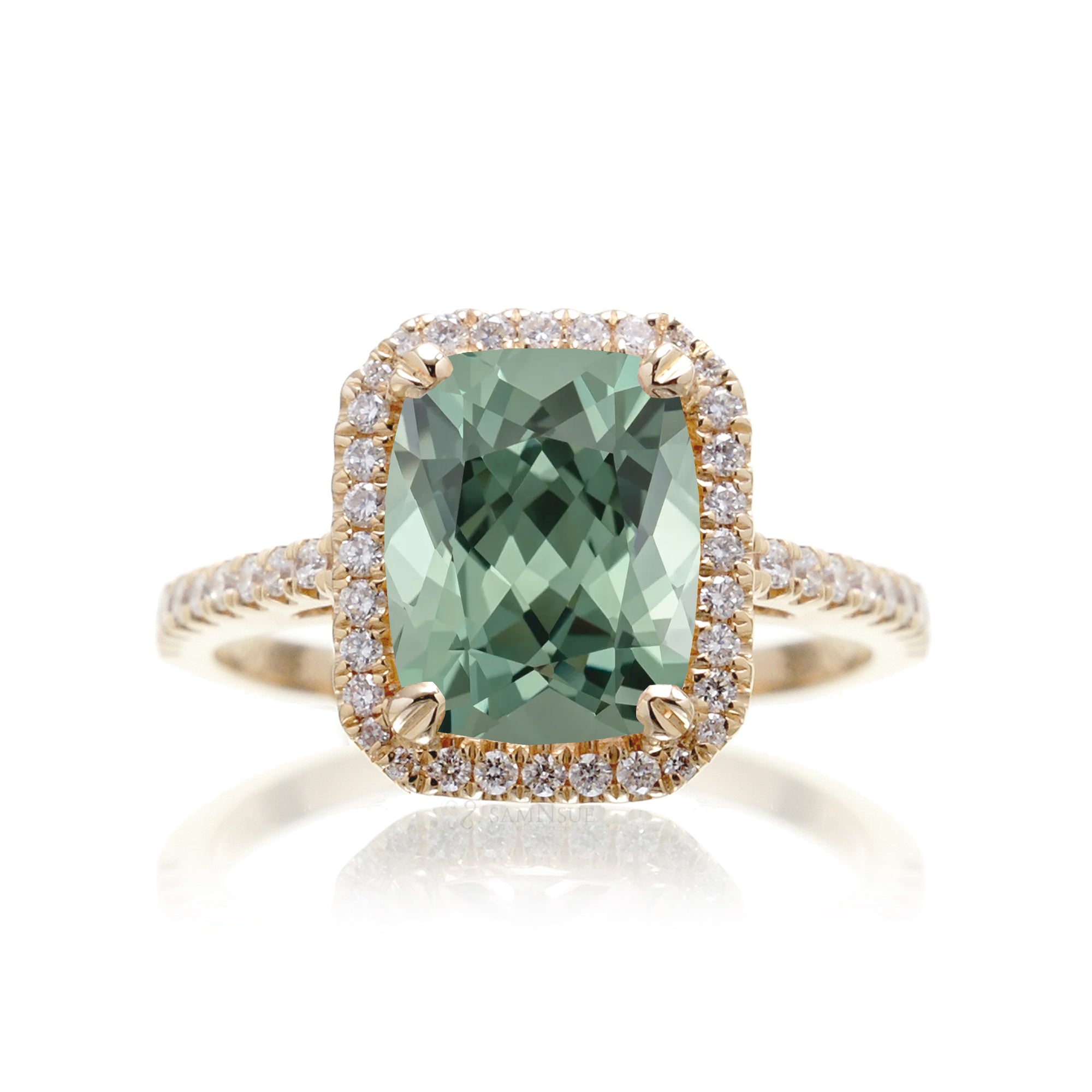 Cushion cut green sapphire engagement ring The signature diamond halo in yellow gold