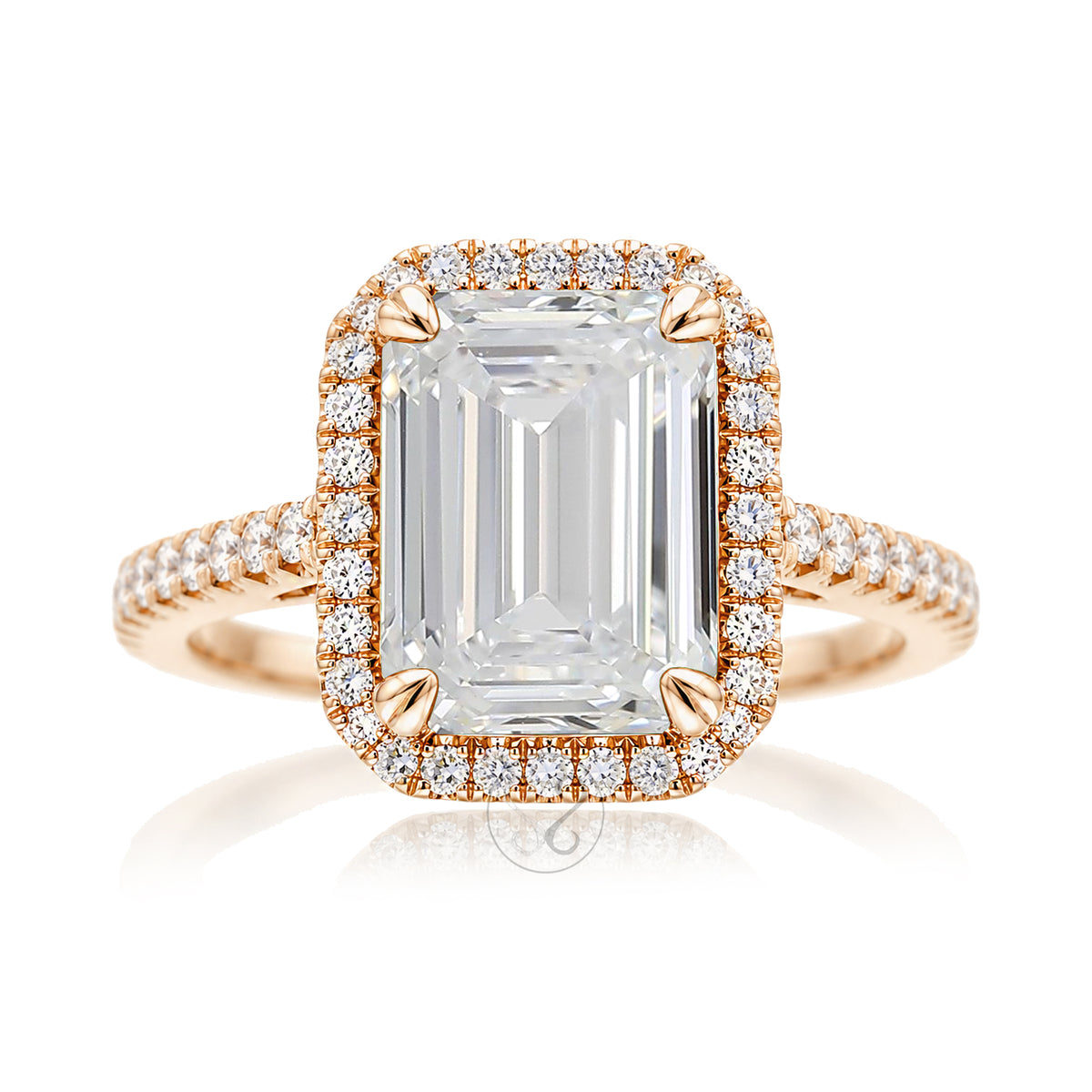Emerald step cut diamond halo ring with a squarish band and cathedral setting rose gold