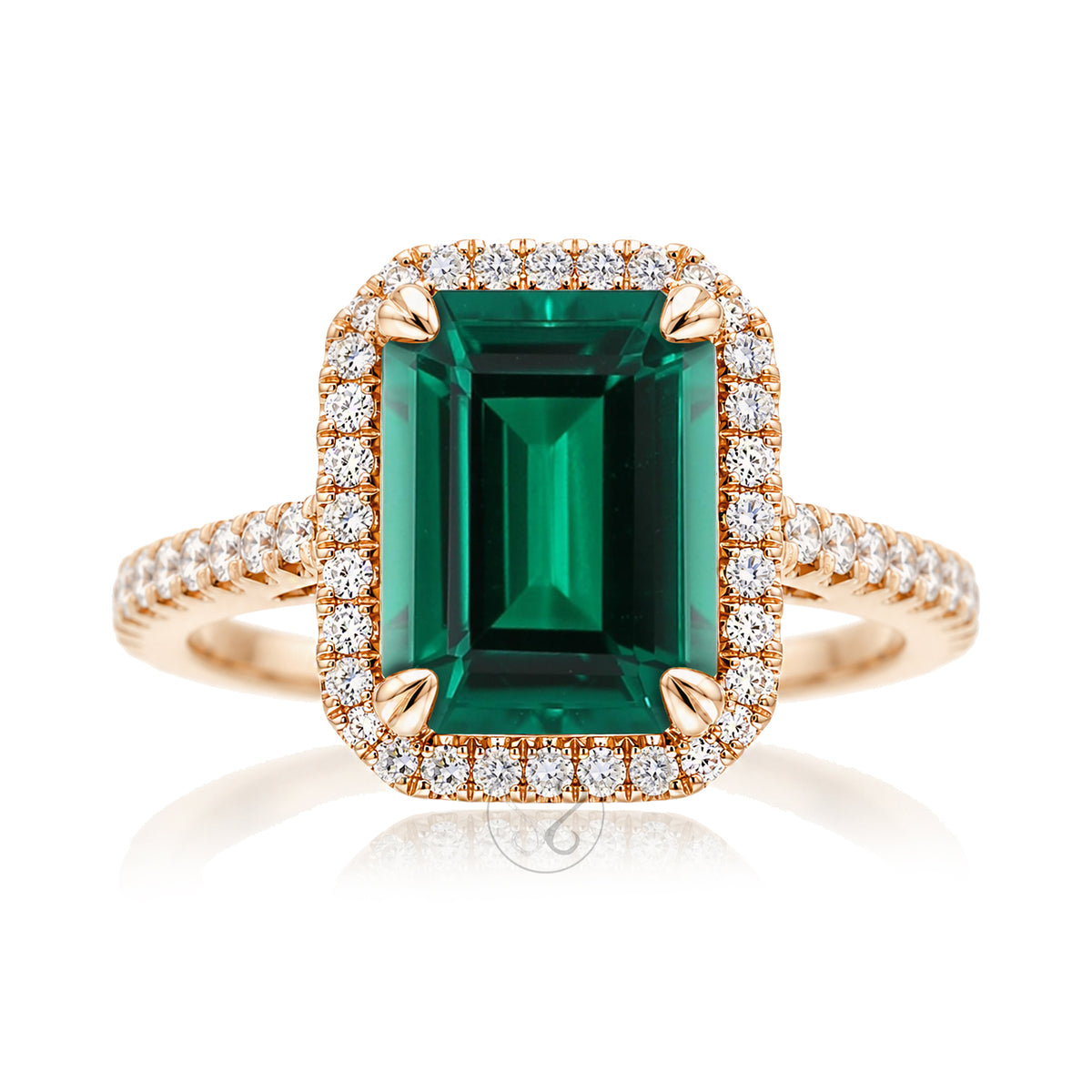 The Signature Step Cut Green Emerald Ring
