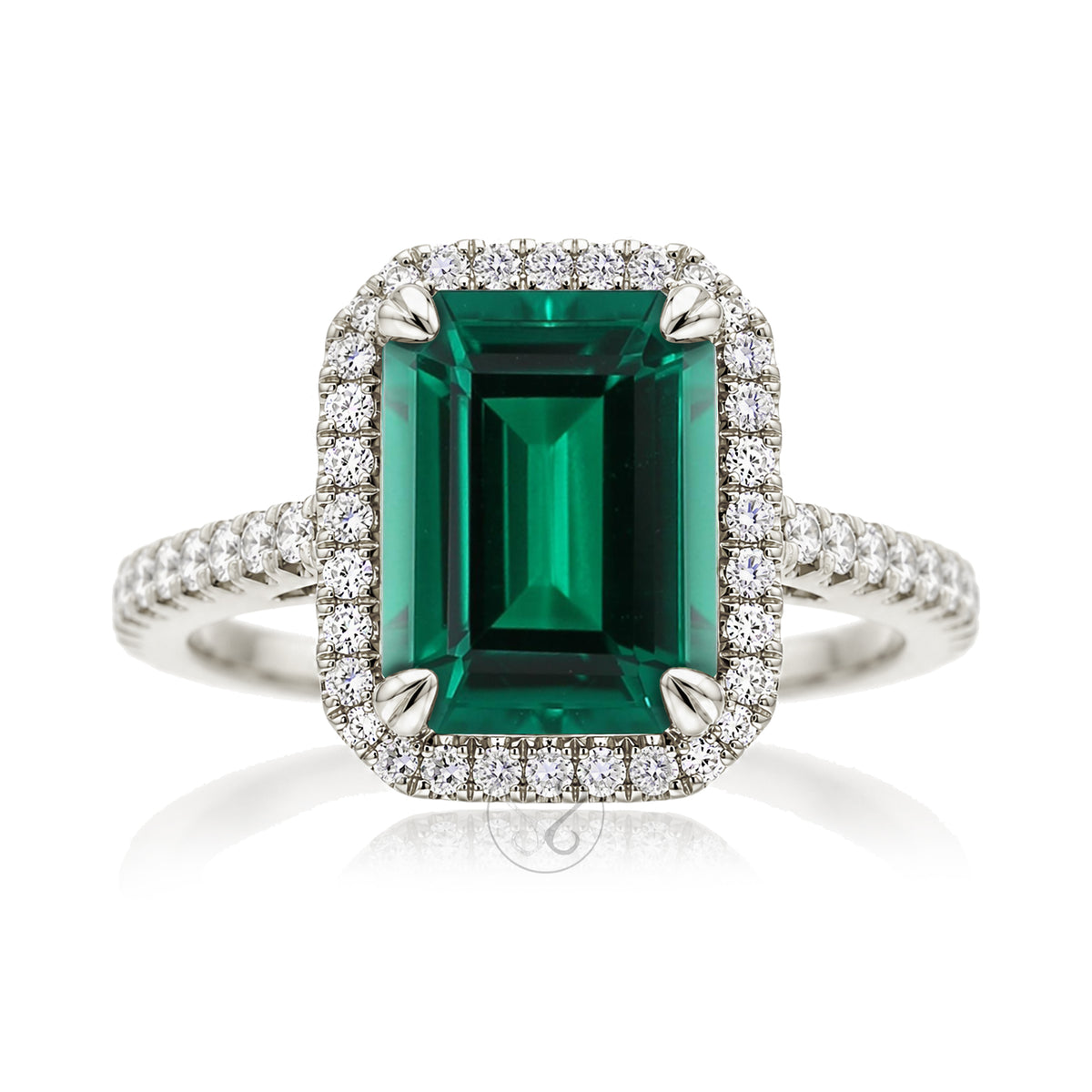 The Signature Step Cut Green Emerald Ring