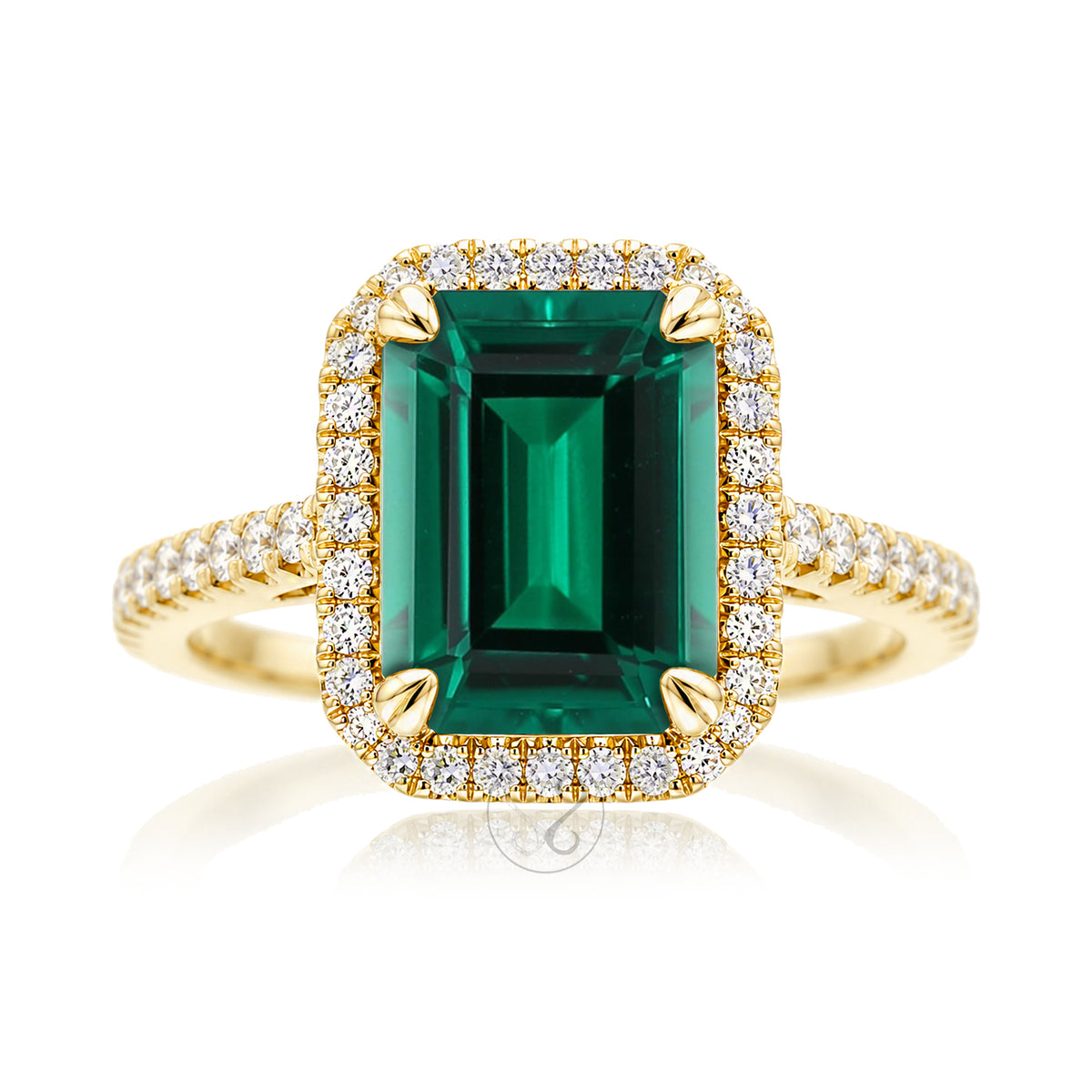 The Signature Step Cut Green Emerald Ring